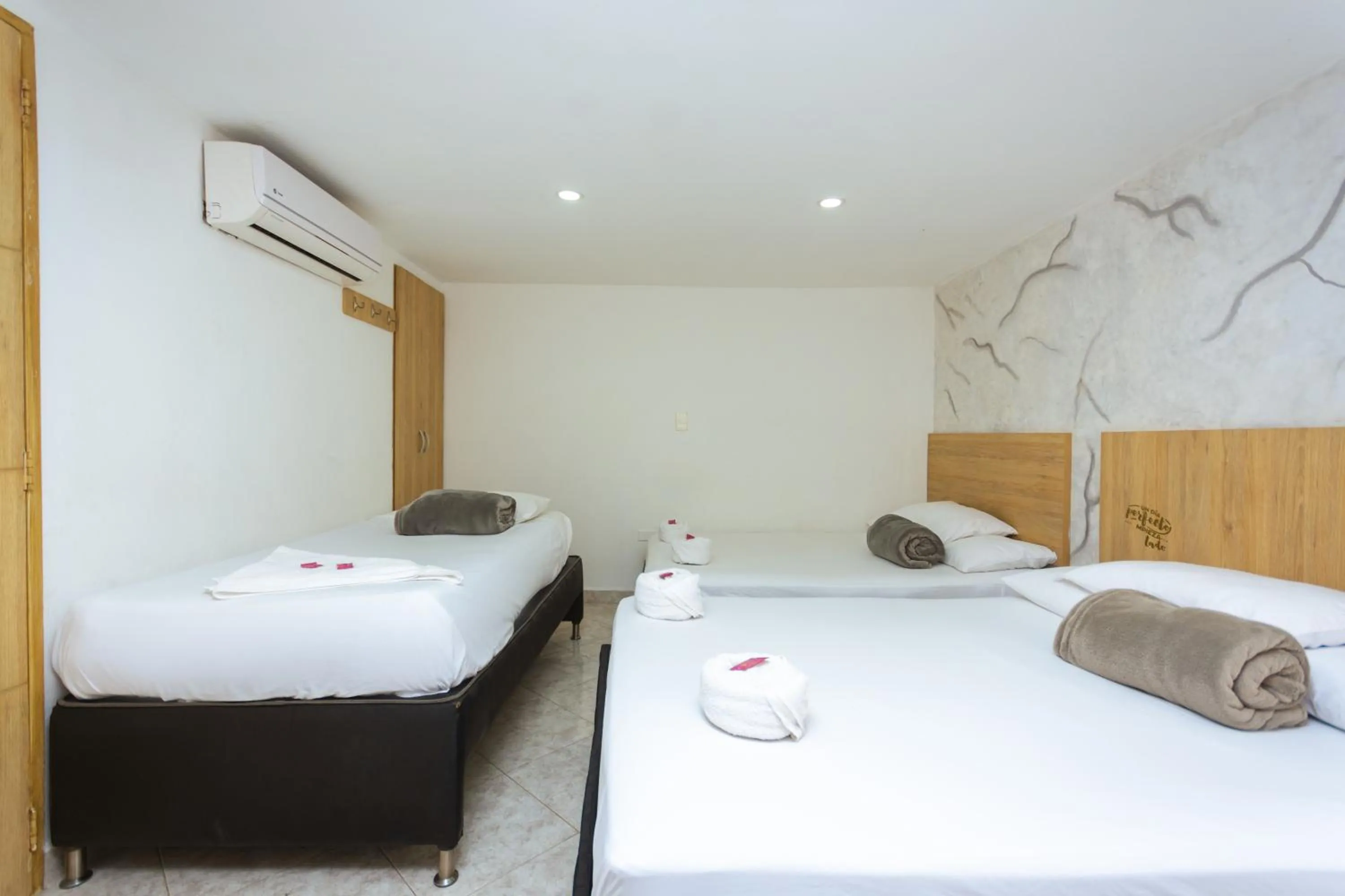 Bed in Hotel Colores Boutique