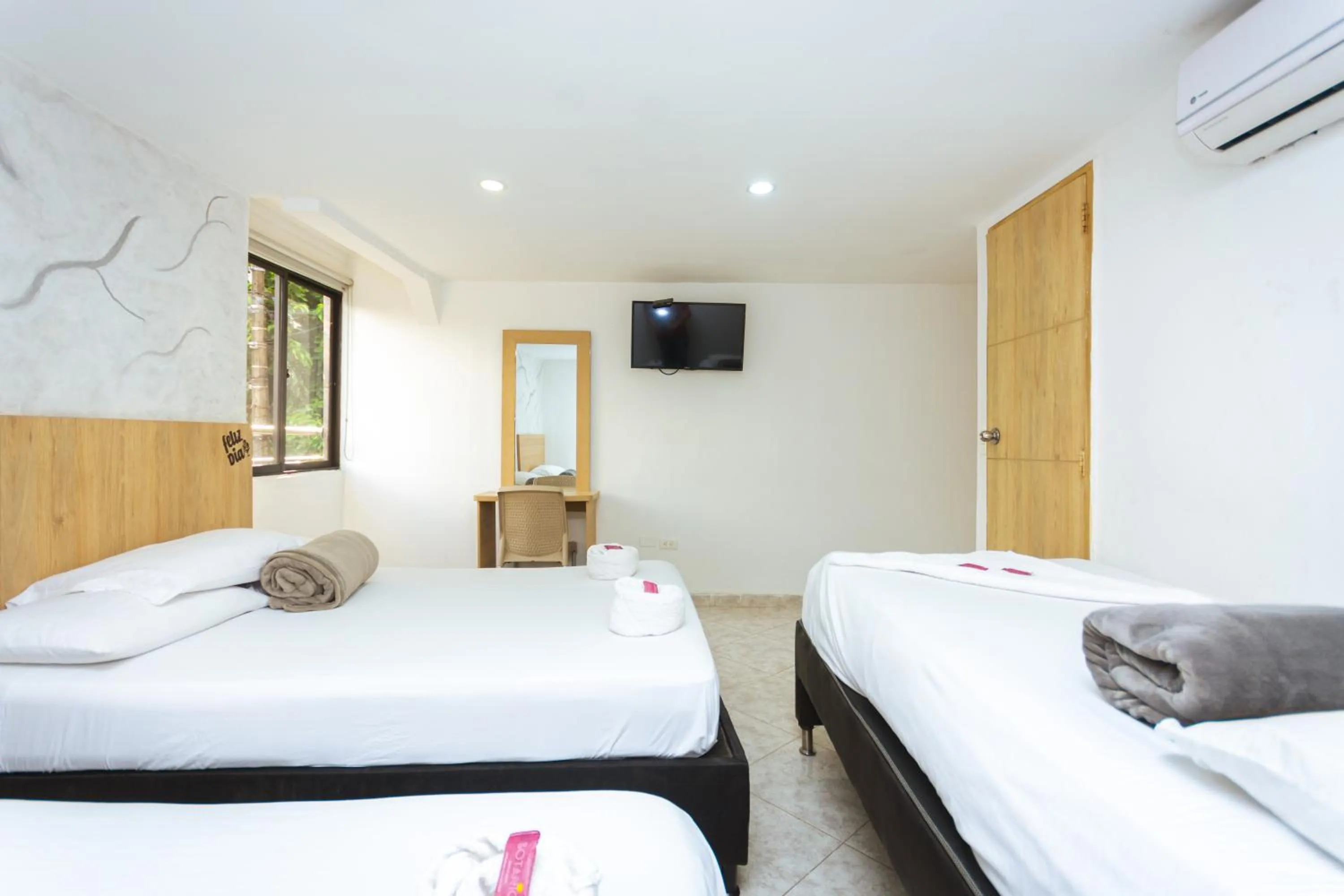 Bed in Hotel Colores Boutique