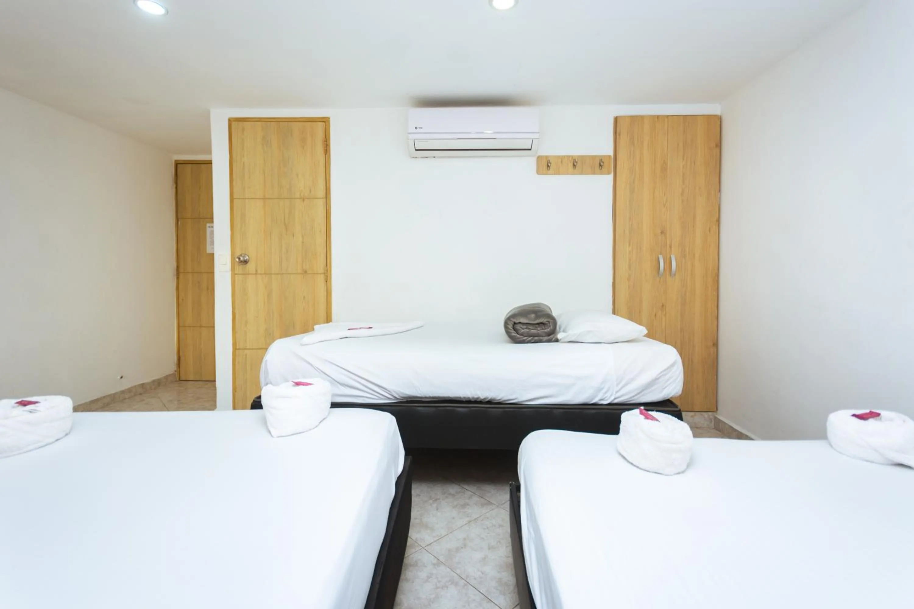 Bed in Hotel Colores Boutique