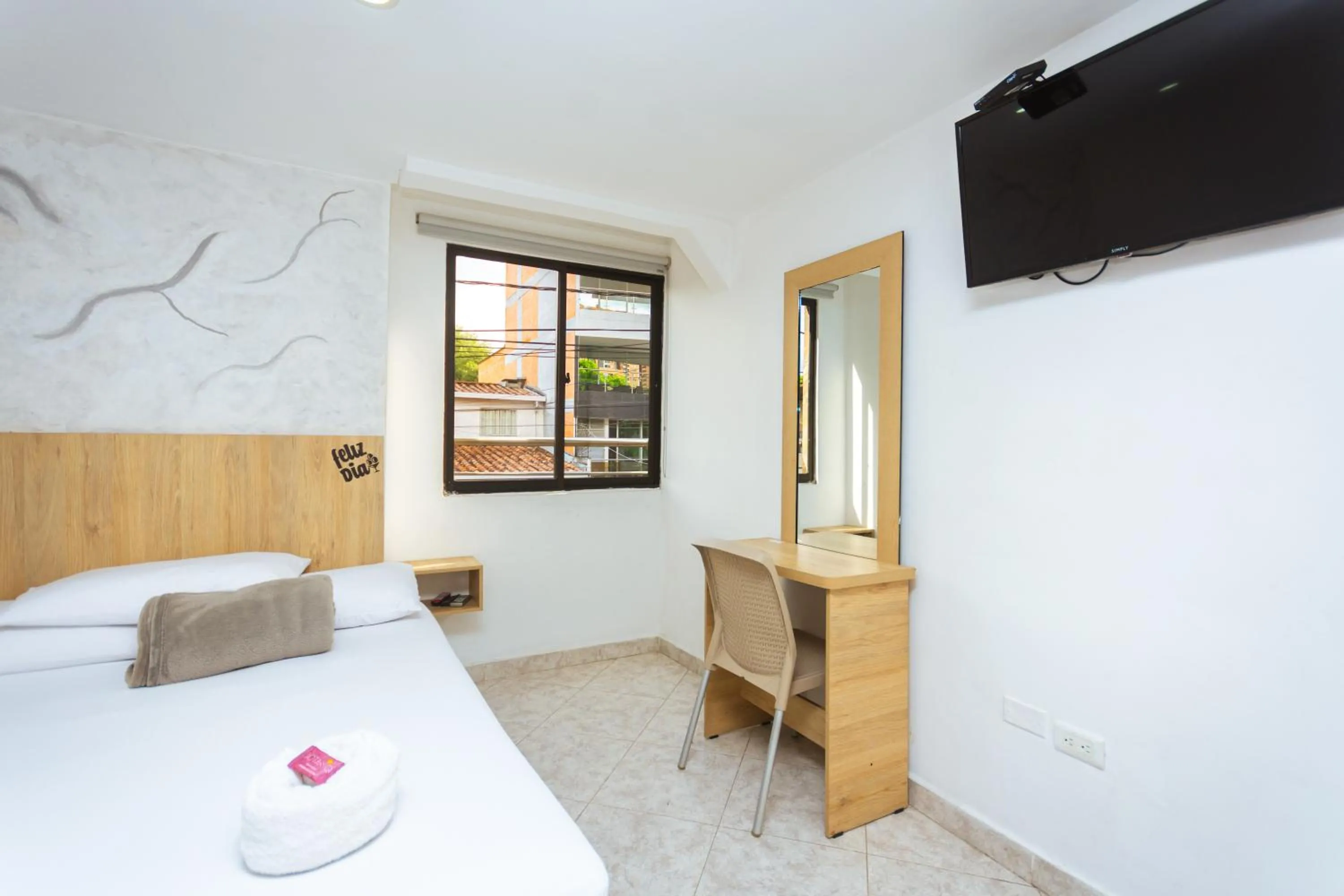 Bed in Hotel Colores Boutique