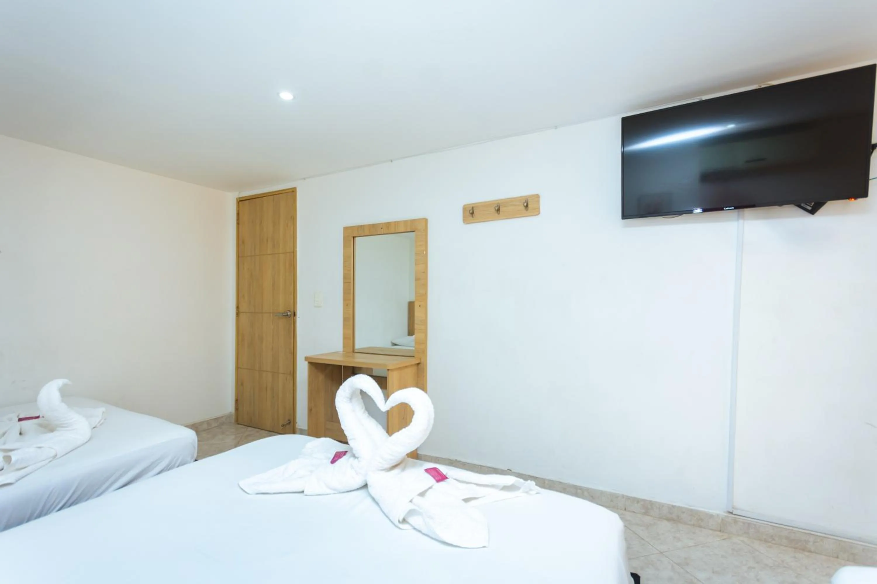 Bed in Hotel Colores Boutique