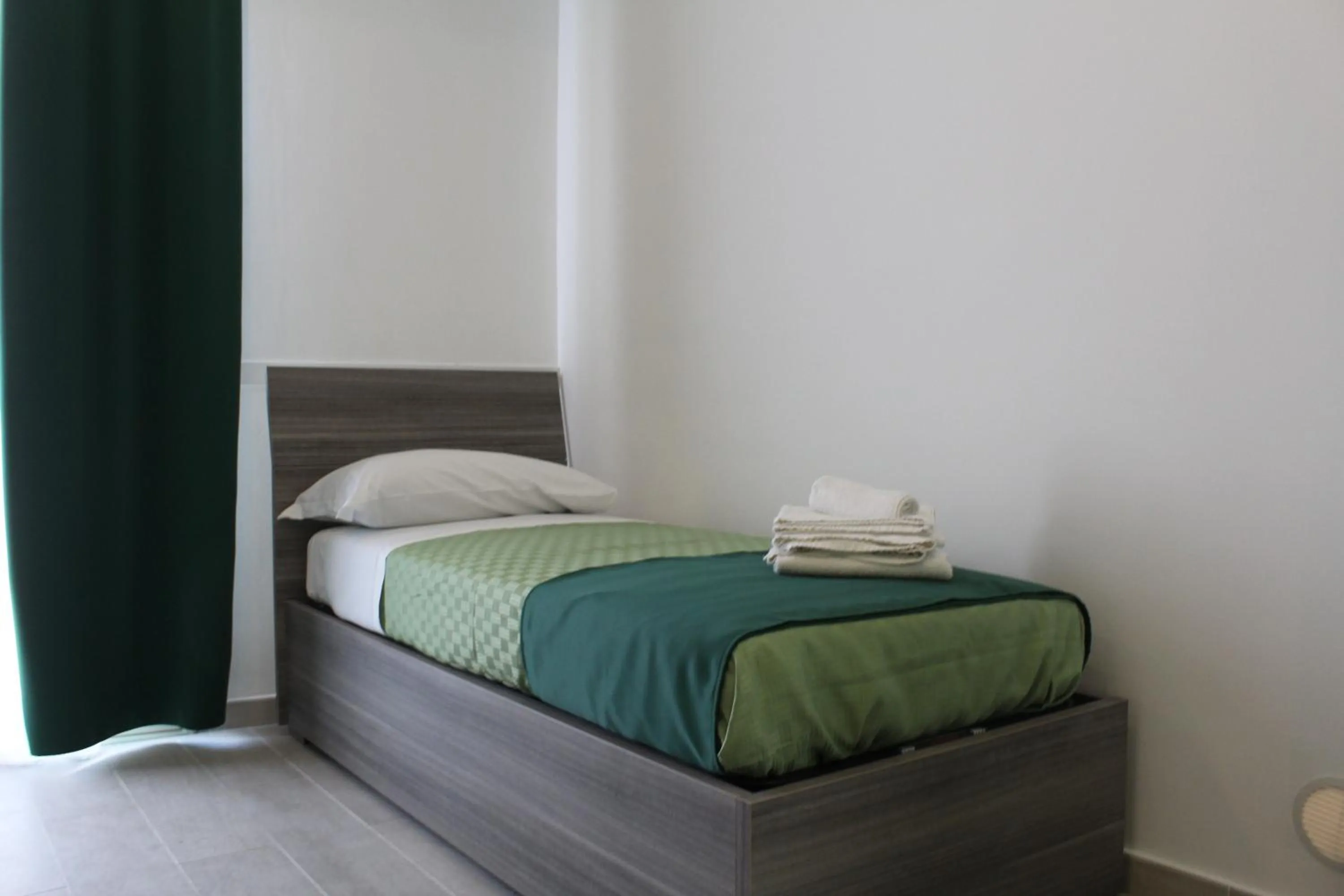 Bed in Naxos Laguna Beach