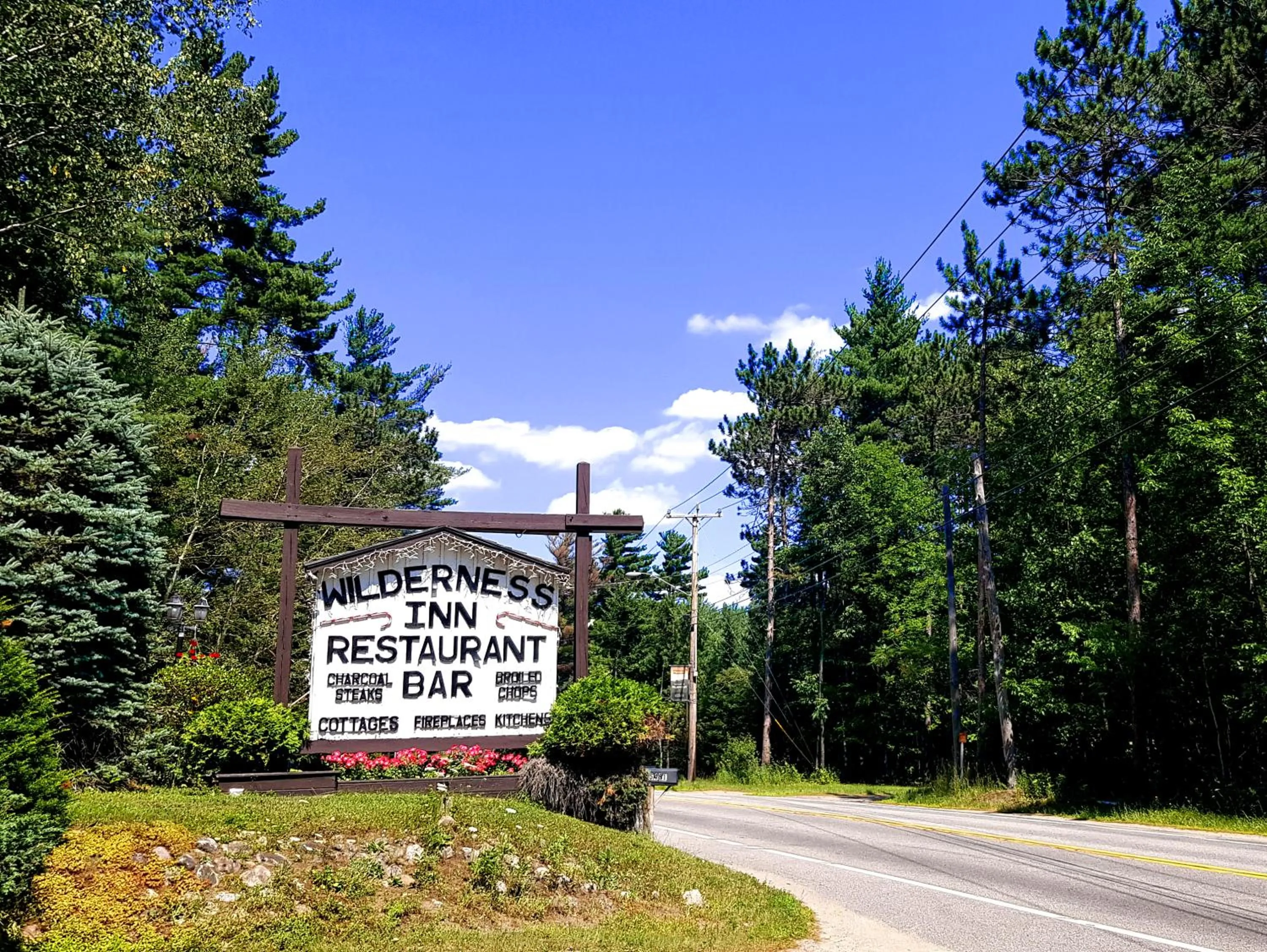 Logo/Certificate/Sign in The Wilderness Inn: Chalets