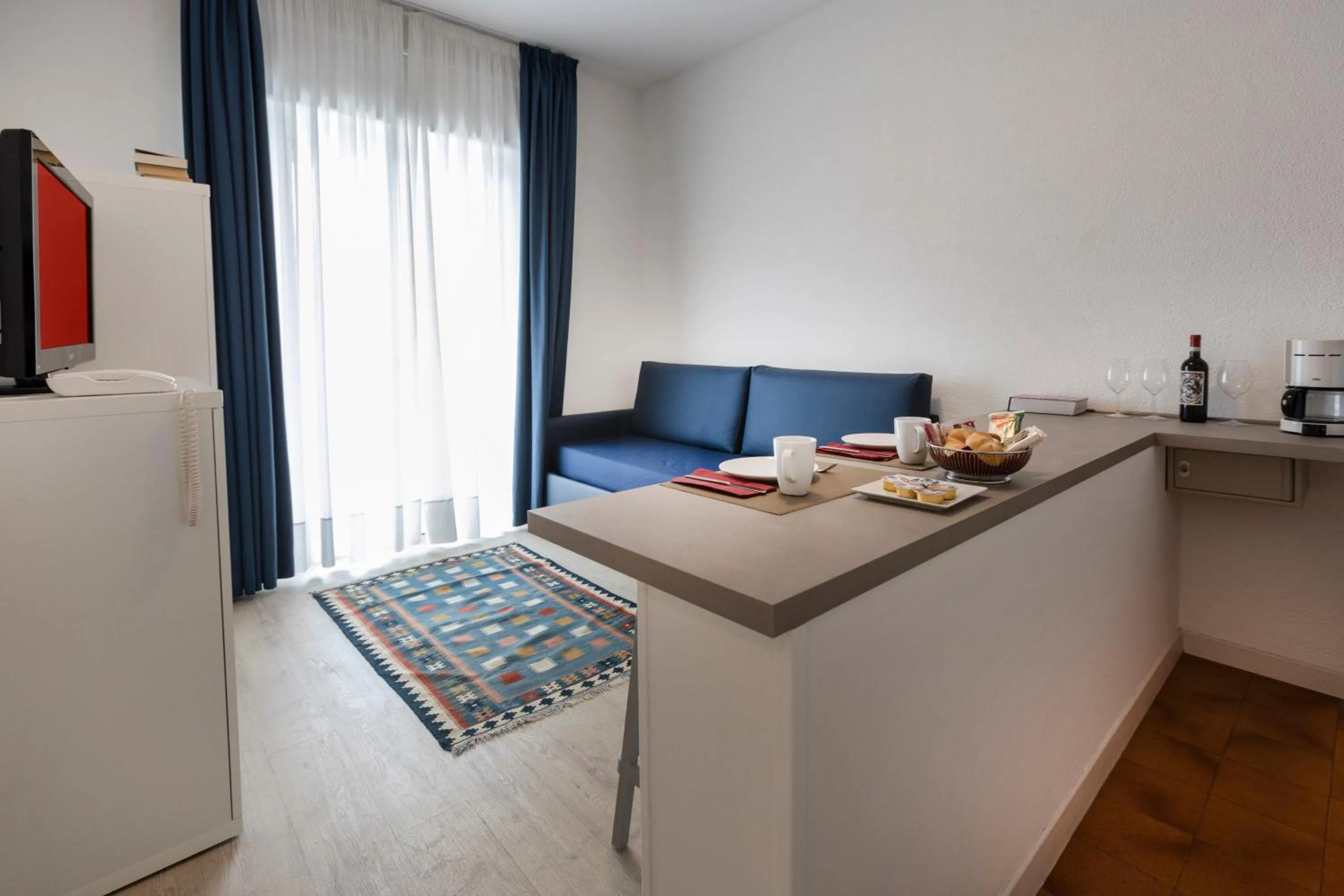 Photo of the whole room in Hotel Roma Aparthotel