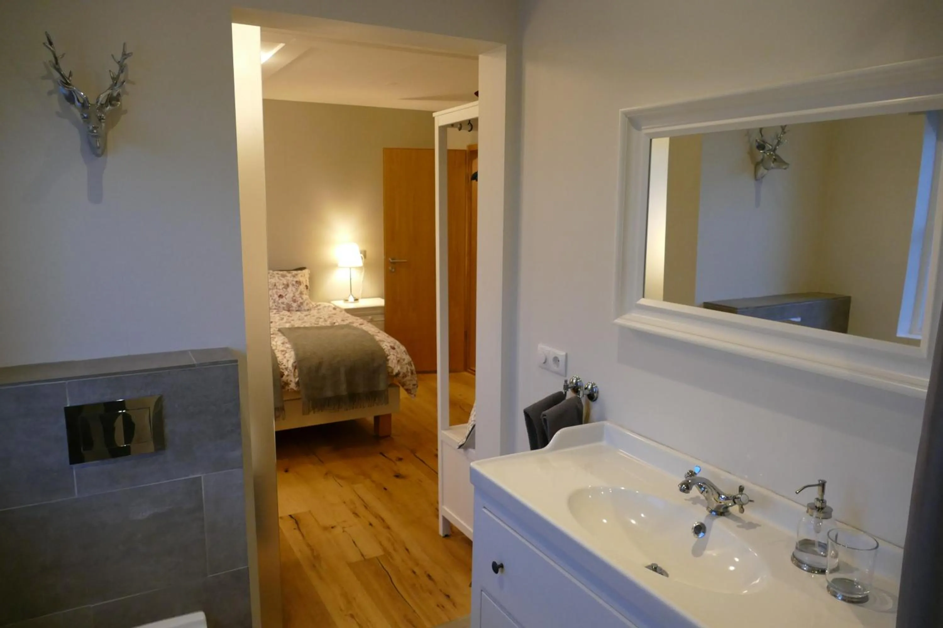 Bathroom, Bed in Riverfront romantic Asgardur vacation home of comfort