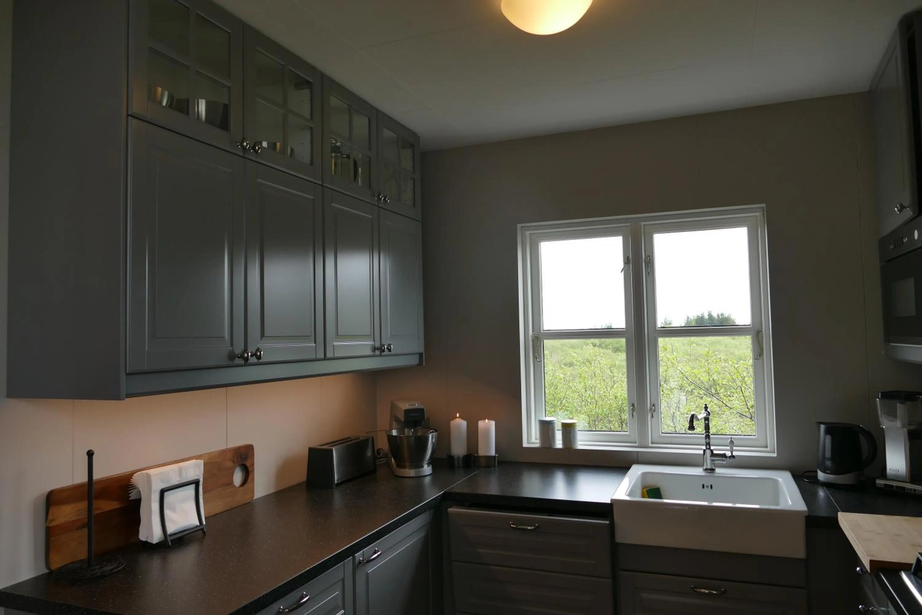 Kitchen or kitchenette in Riverfront romantic Asgardur vacation home of comfort