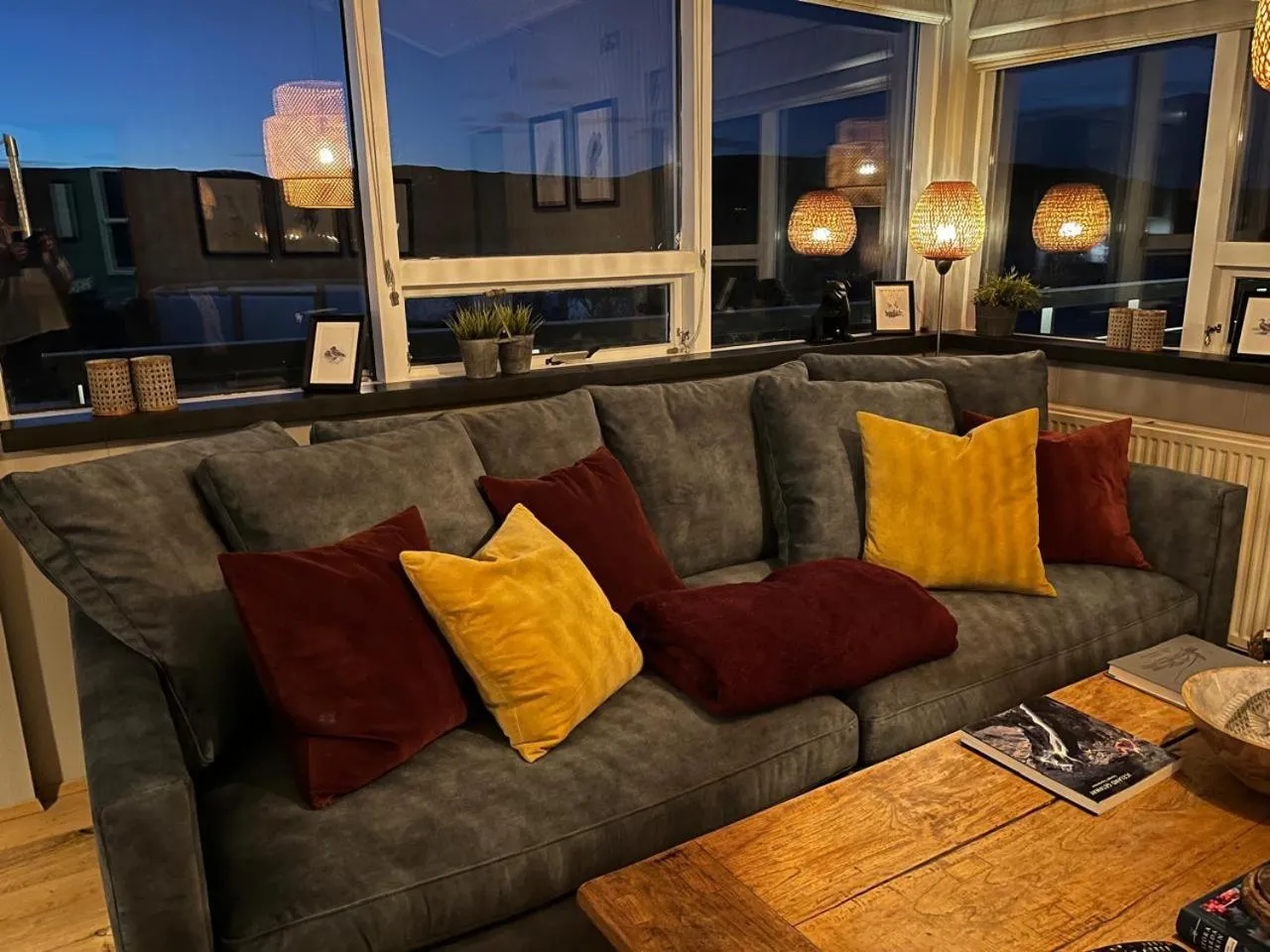 Living room in Riverfront romantic Asgardur vacation home of comfort