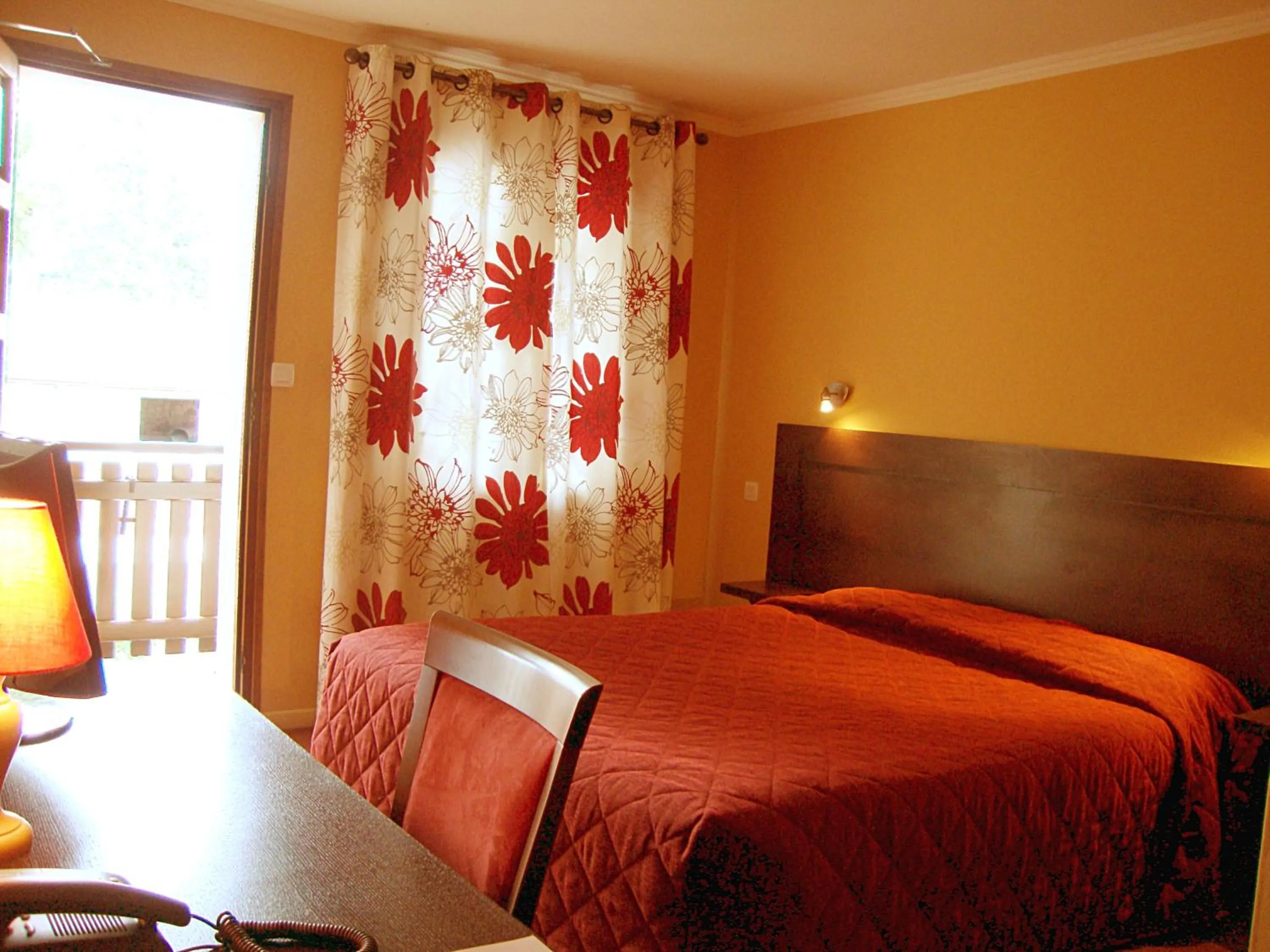 Photo of the whole room, Bed in Logis Des Trois Maures