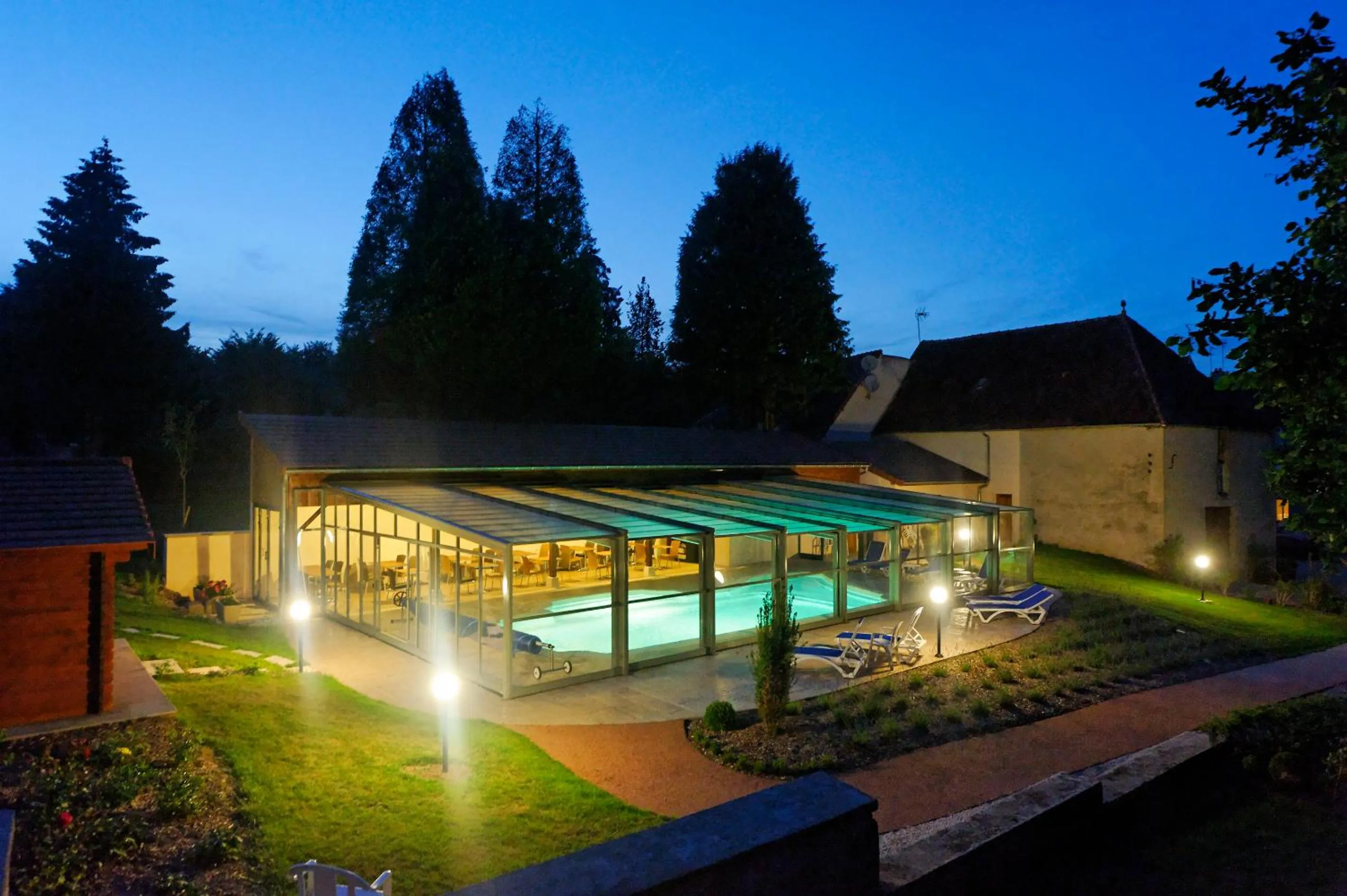 Swimming pool in Logis Des Trois Maures