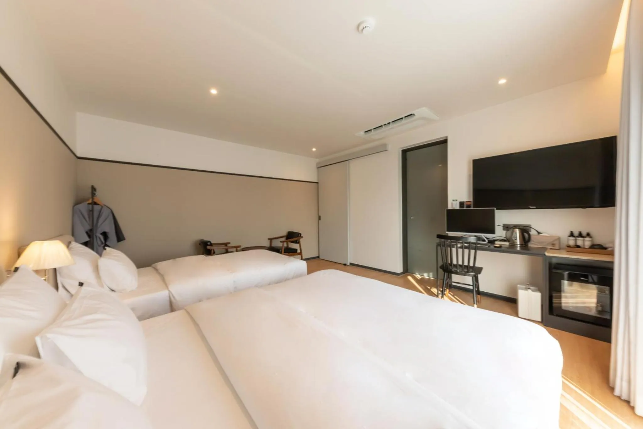 Bed in Brown-Dot Hotel Dongchon Amusement Park