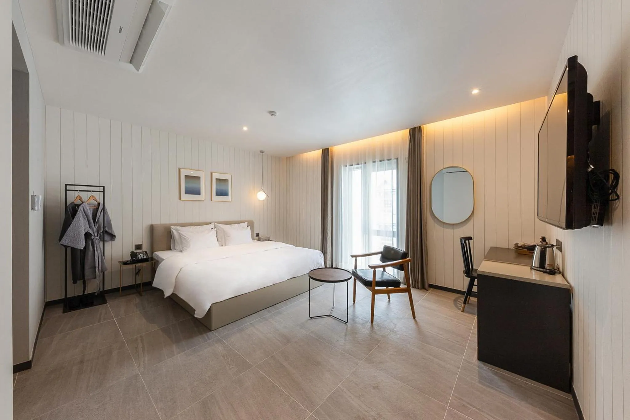 Bed in Brown-Dot Hotel Dongchon Amusement Park