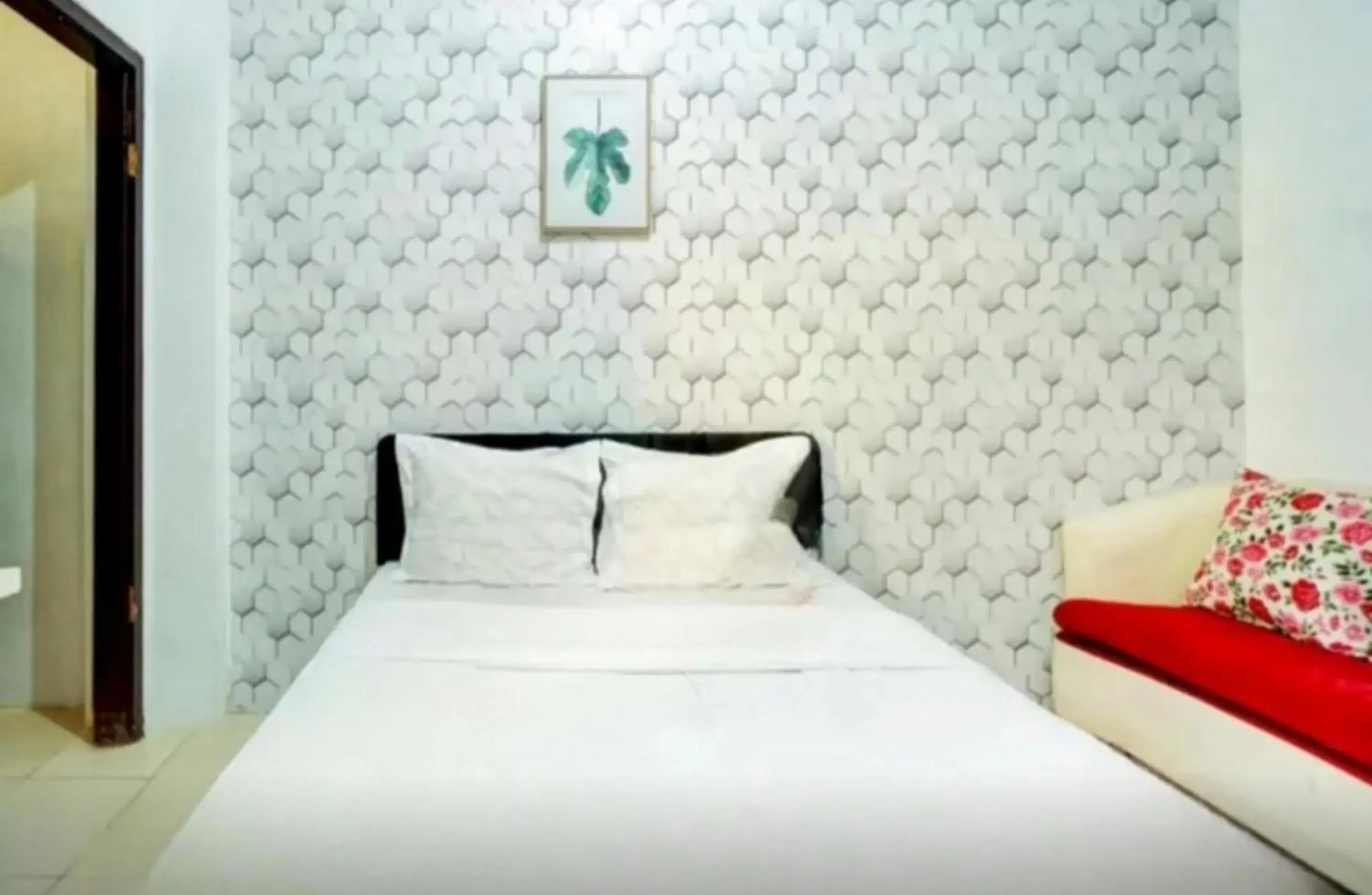 Bed in RedDoorz near Plaza Araya Malang Bed in RedDoorz near Plaza Araya Malang