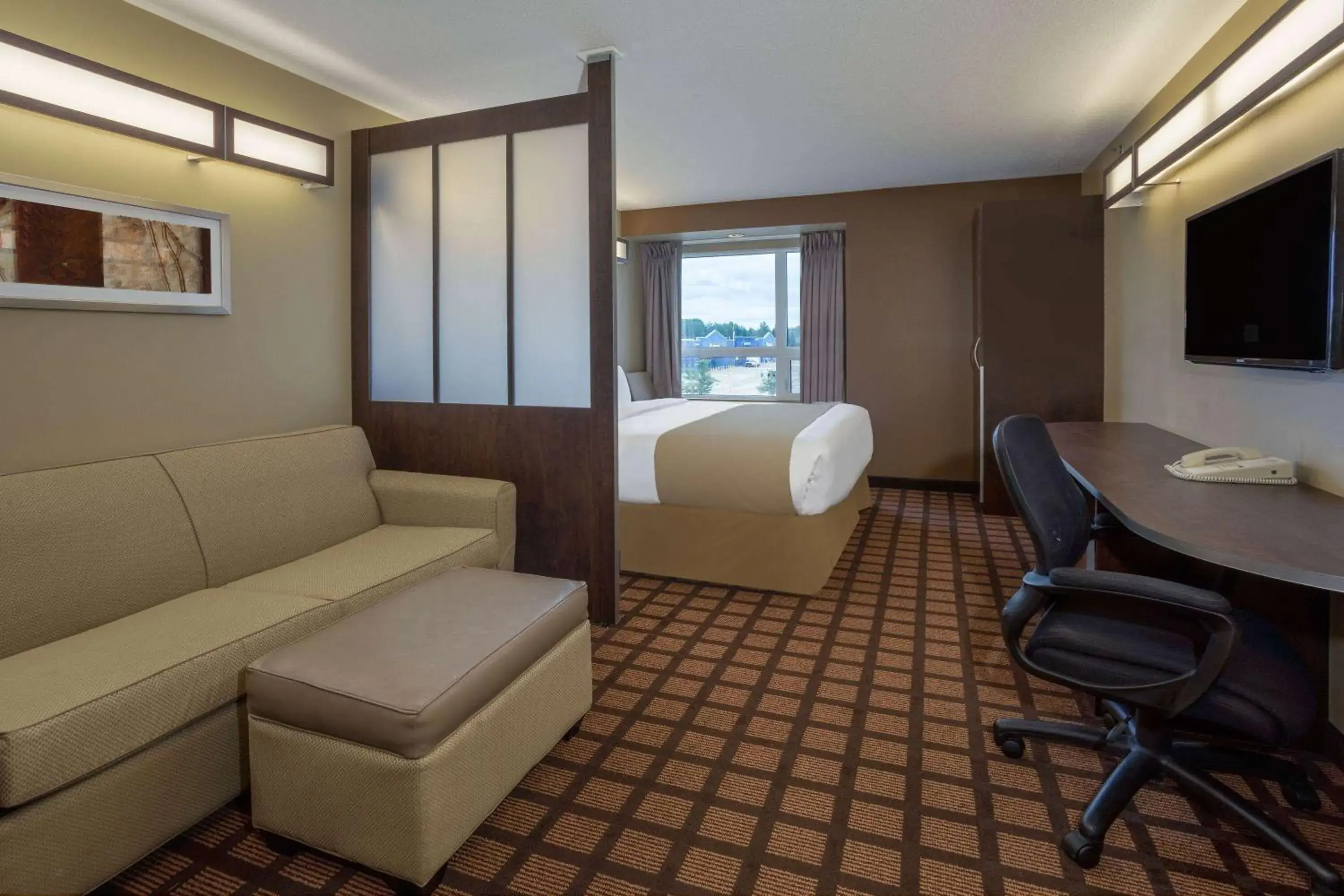 King Suite with Sofa Bed - Non-Smoking in Microtel Inn & Suites by Wyndham - Timmins King Suite with Sofa Bed - Non-Smoking in Microtel Inn & Suites by Wyndham - Timmins