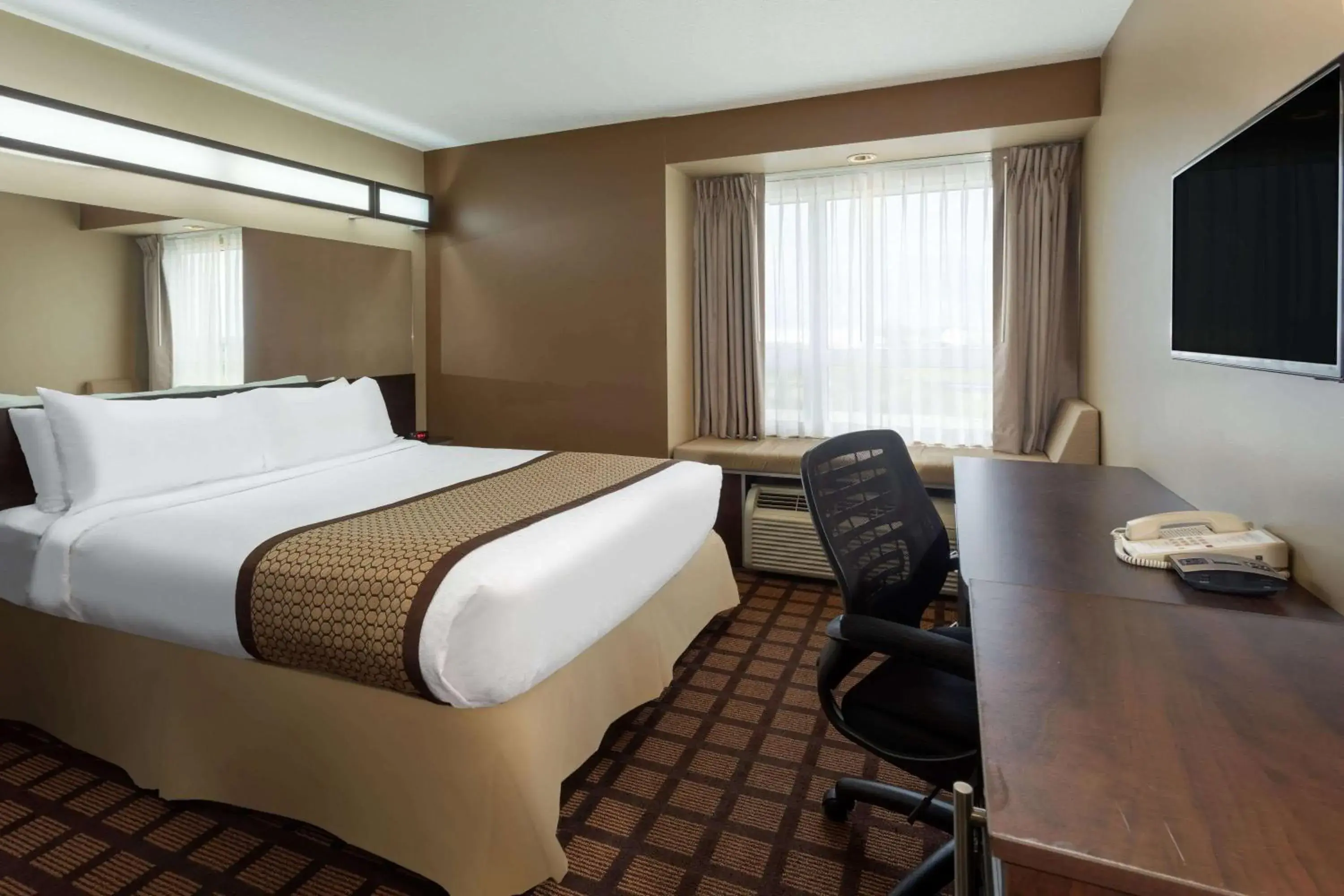Photo of the whole room, Bed in Microtel Inn & Suites by Wyndham - Timmins Photo of the whole room, Bed in Microtel Inn & Suites by Wyndham - Timmins