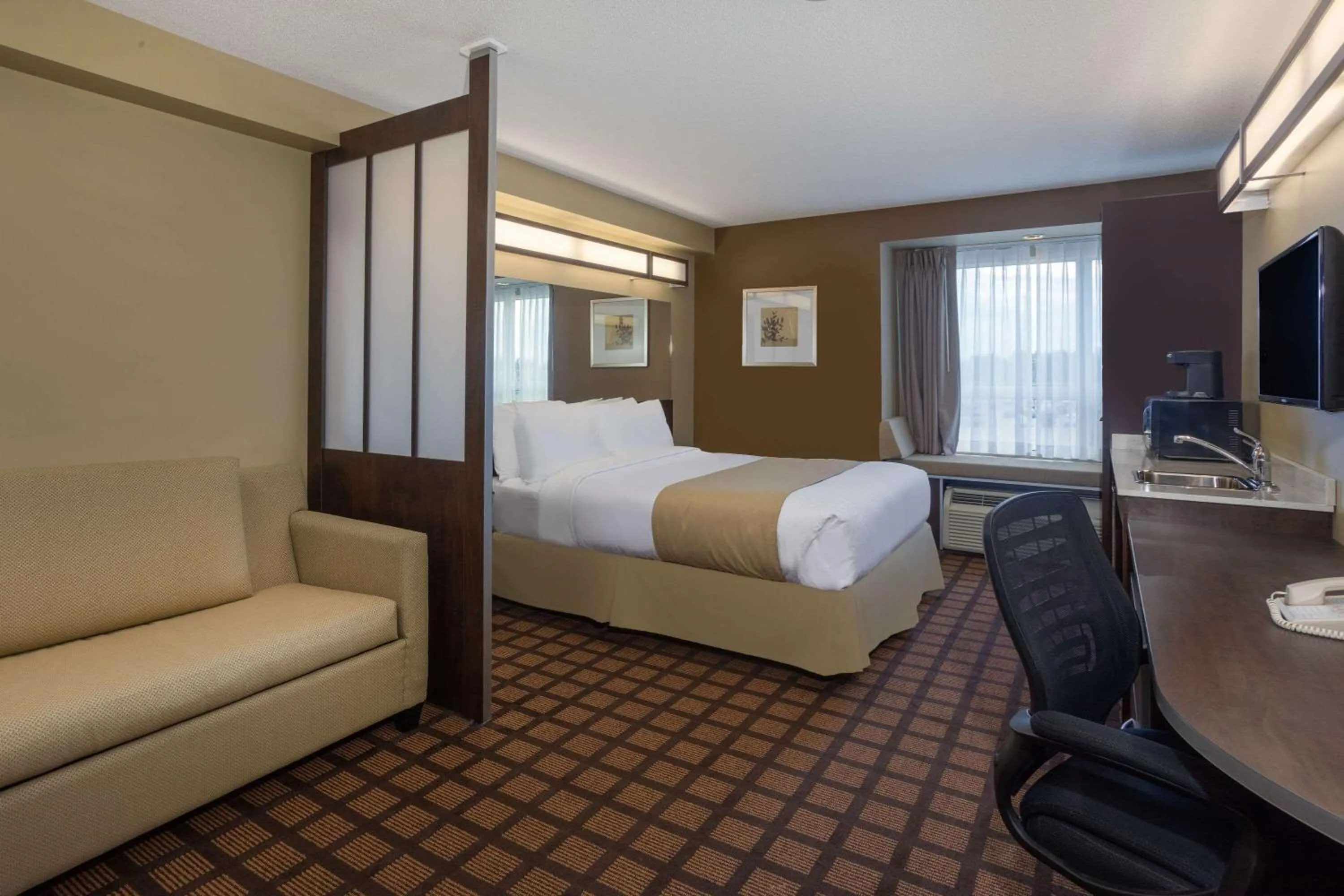 Photo of the whole room, Bed in Microtel Inn & Suites by Wyndham - Timmins