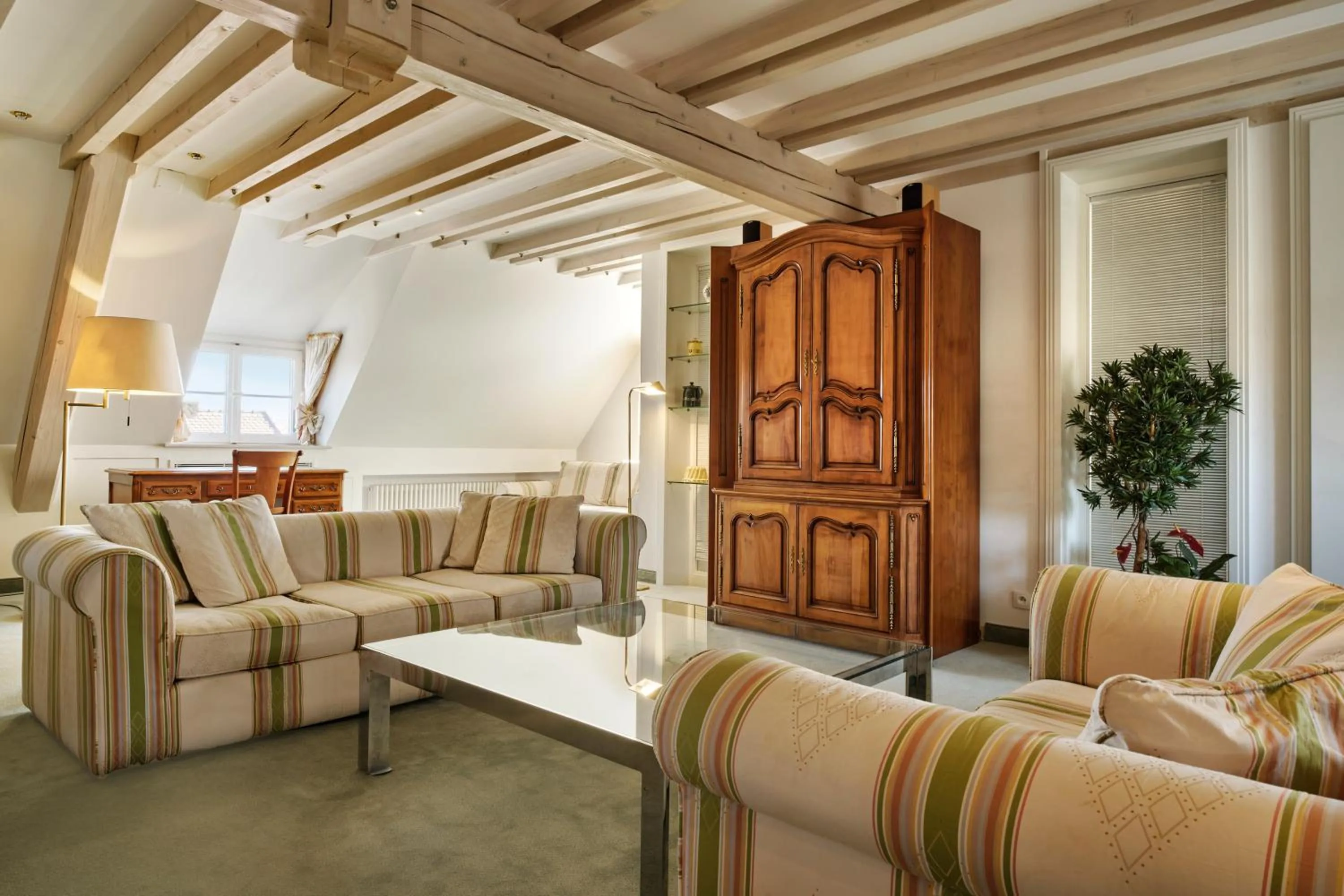 Seating area in Hotel & Spa A la cour d'Alsace by HappyCulture