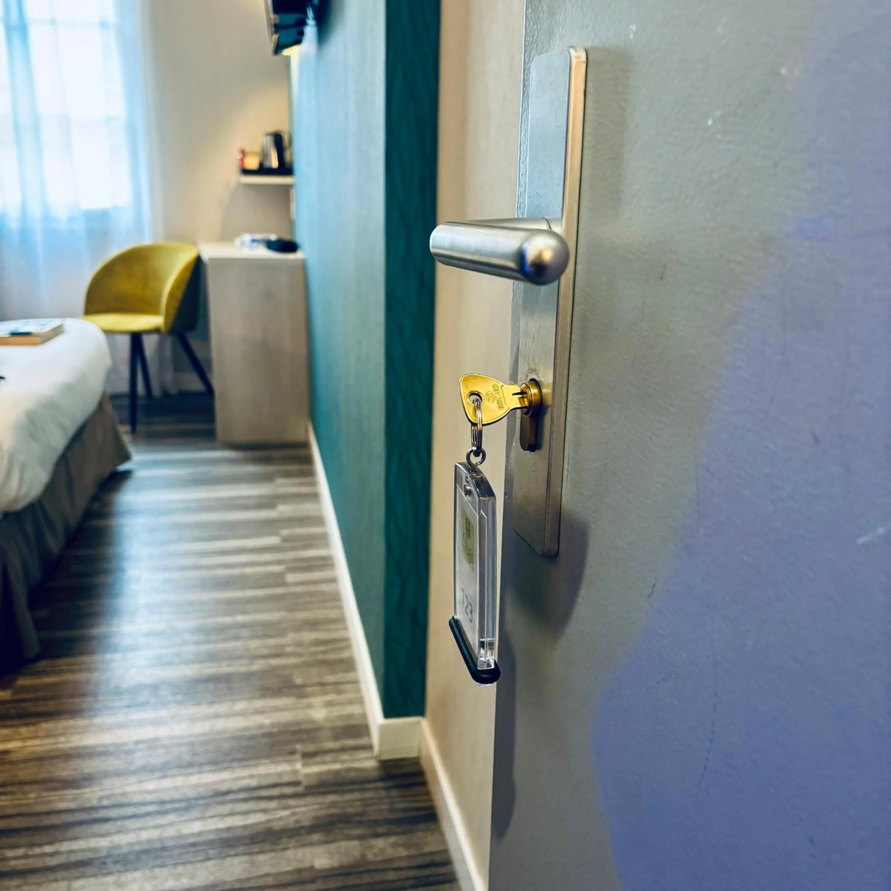 Bedroom in Logis Hôtel-Restaurant LE FONTARABIE