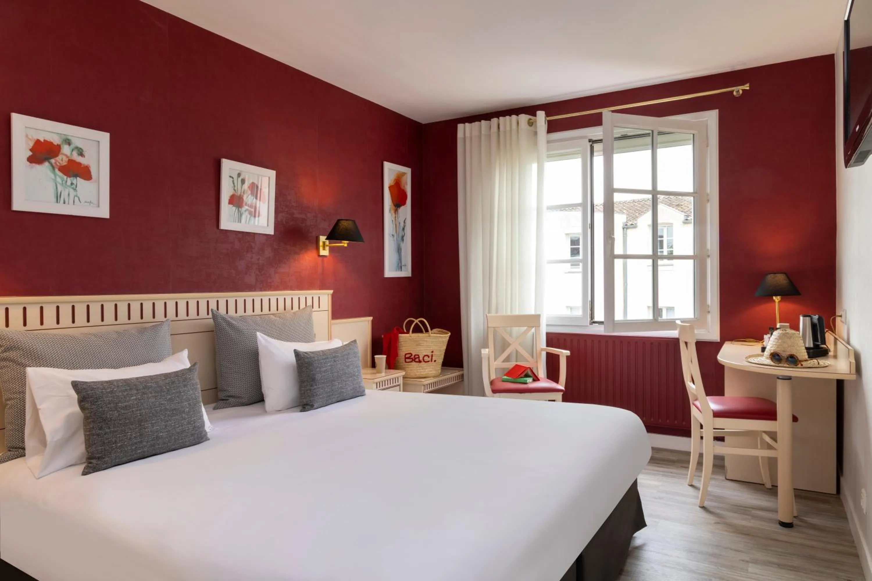 Photo of the whole room, Bed in Logis Hôtel-Restaurant LE FONTARABIE