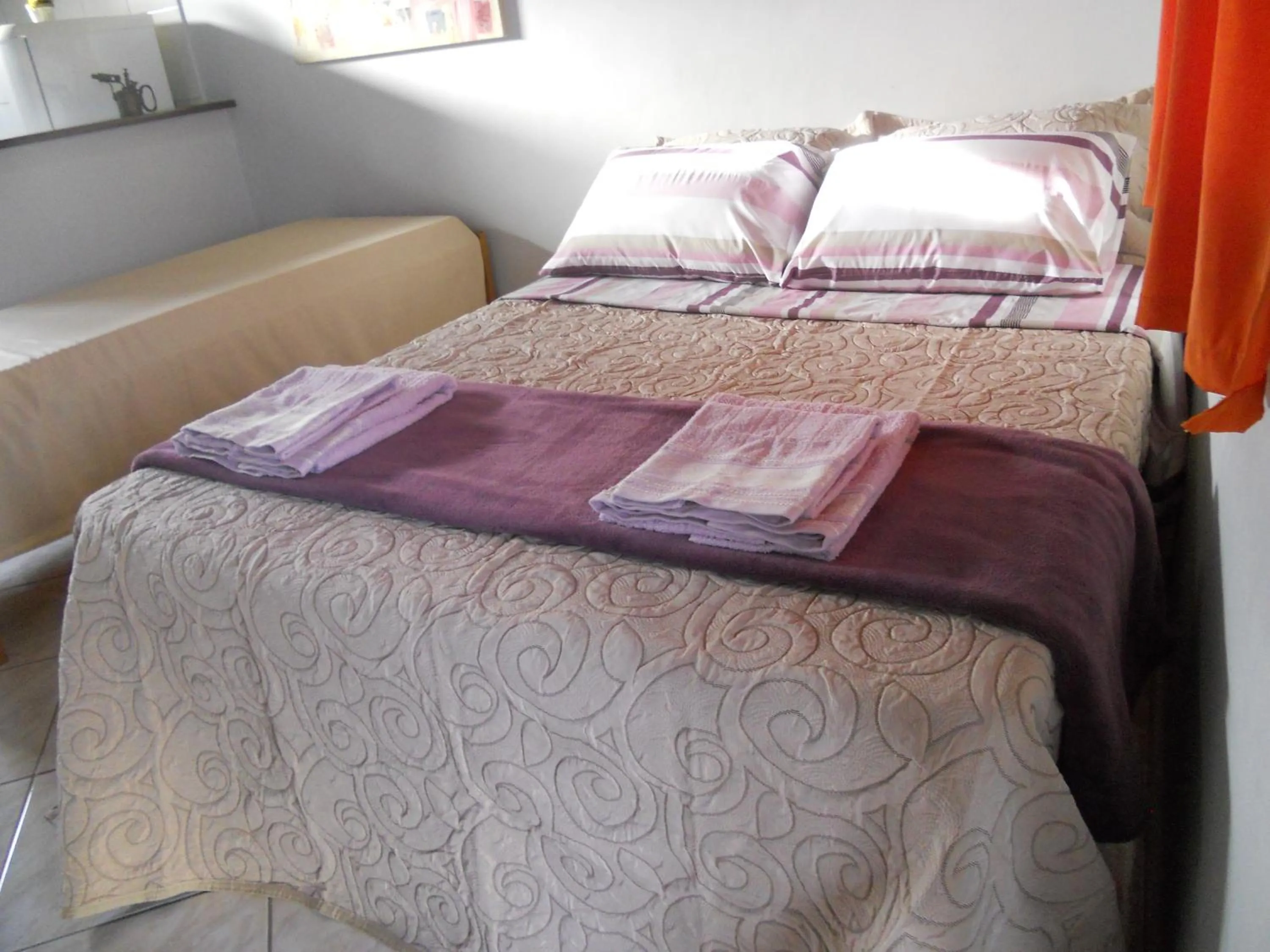 Bed in Pousada Caminho do Mar