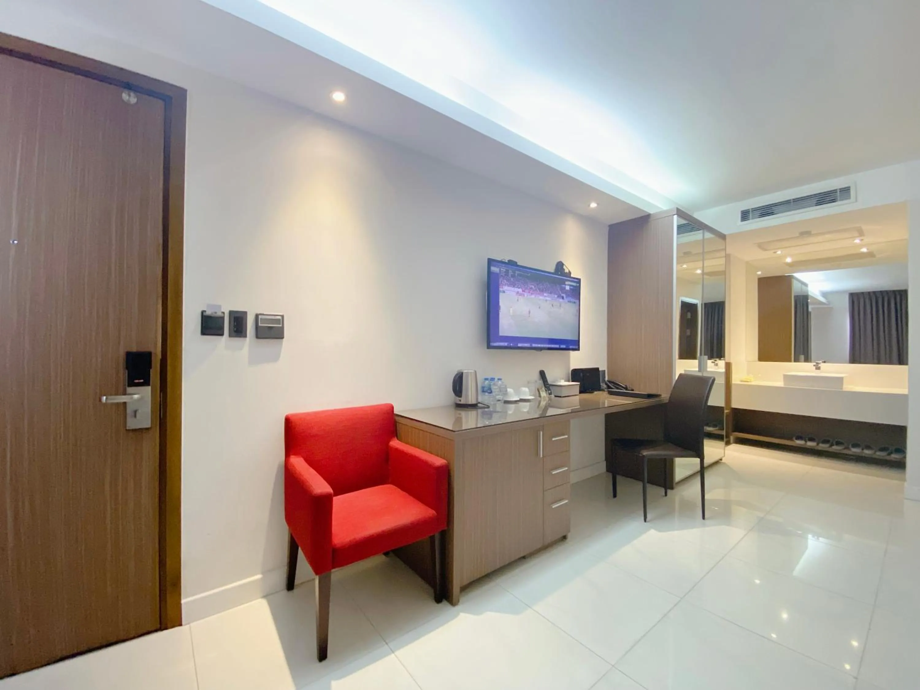 Bedroom in The Luxe Hotel