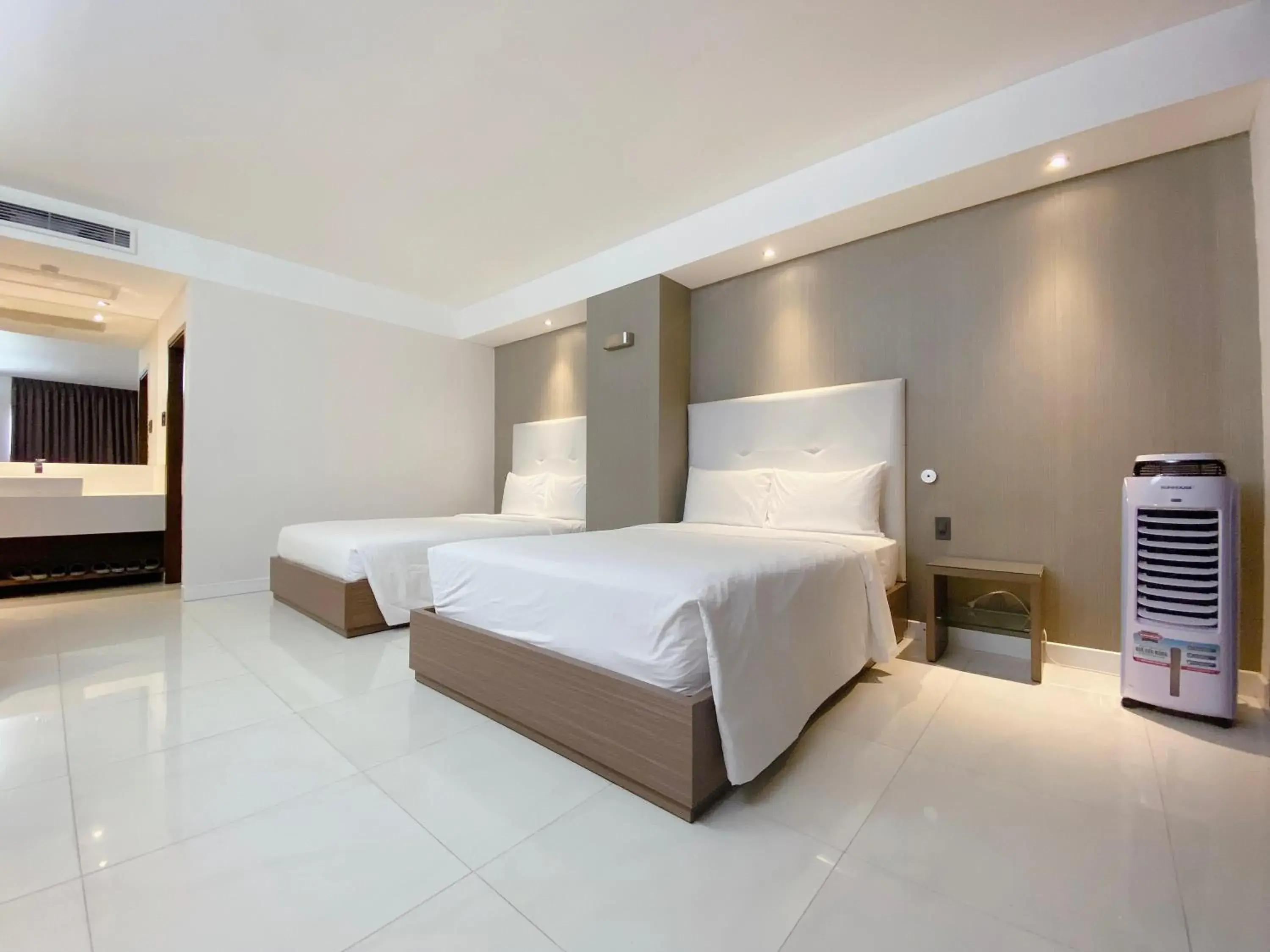 Bedroom in The Luxe Hotel Bedroom in The Luxe Hotel