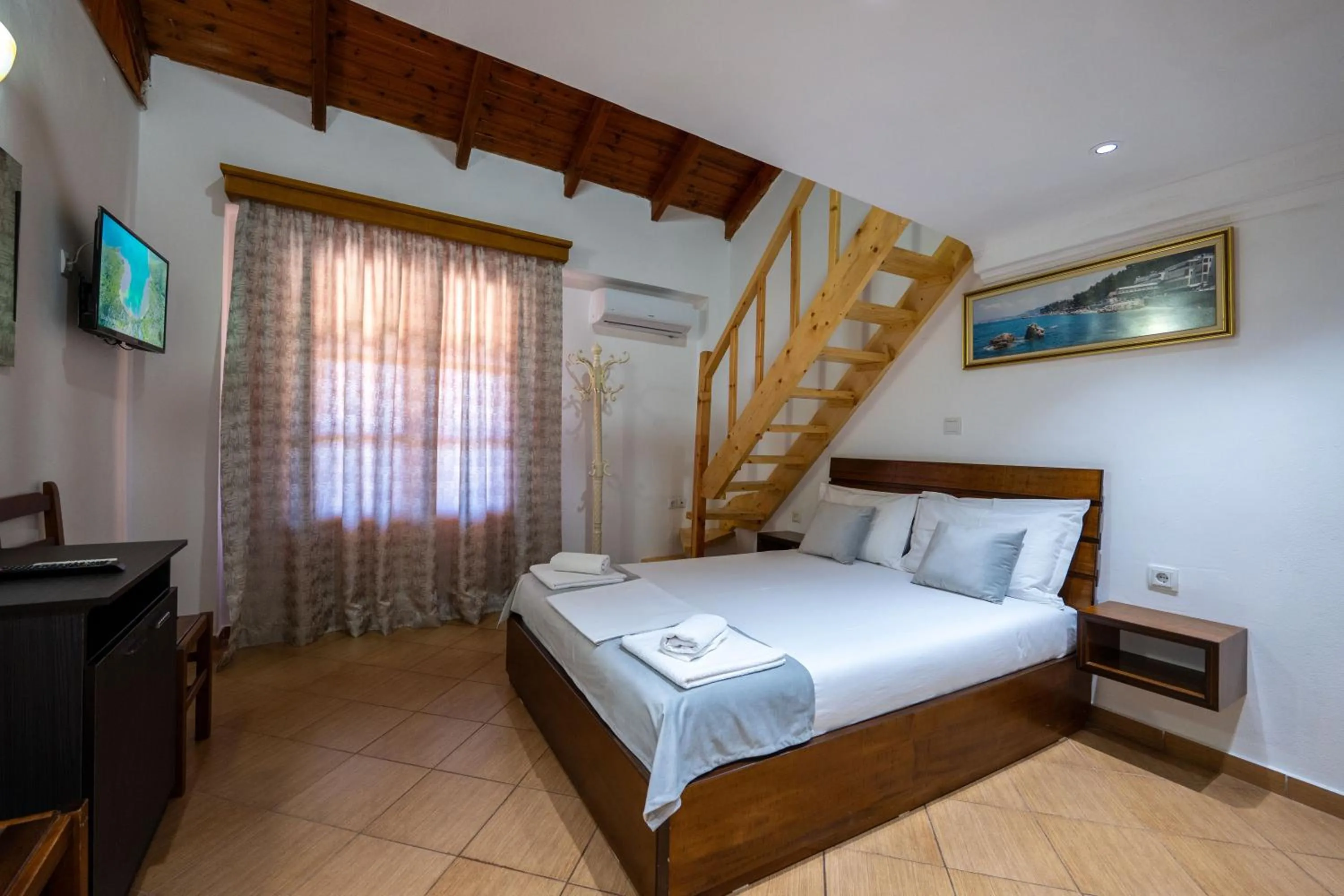 Bed in Apart Hotel Alex