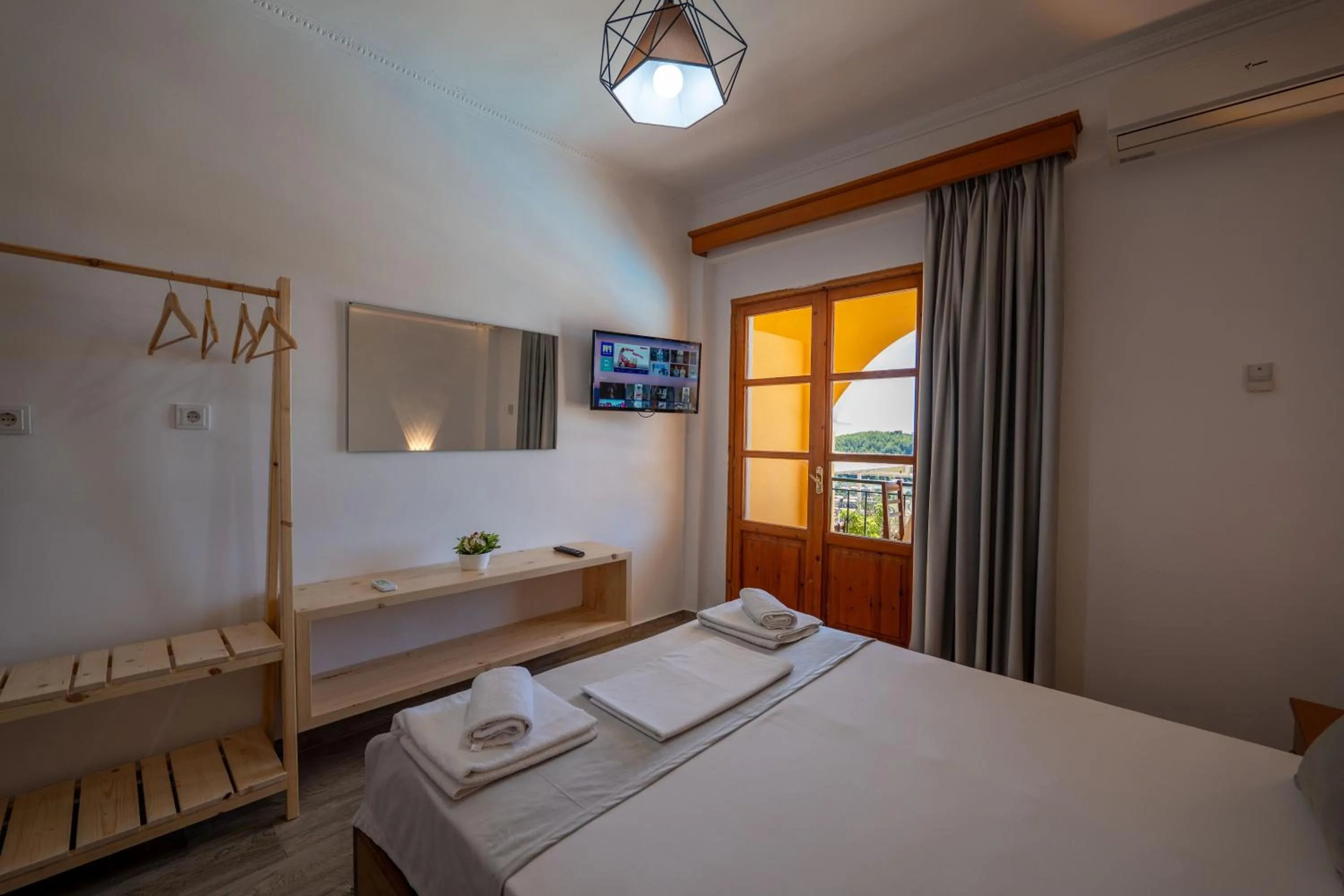 Bed in Apart Hotel Alex