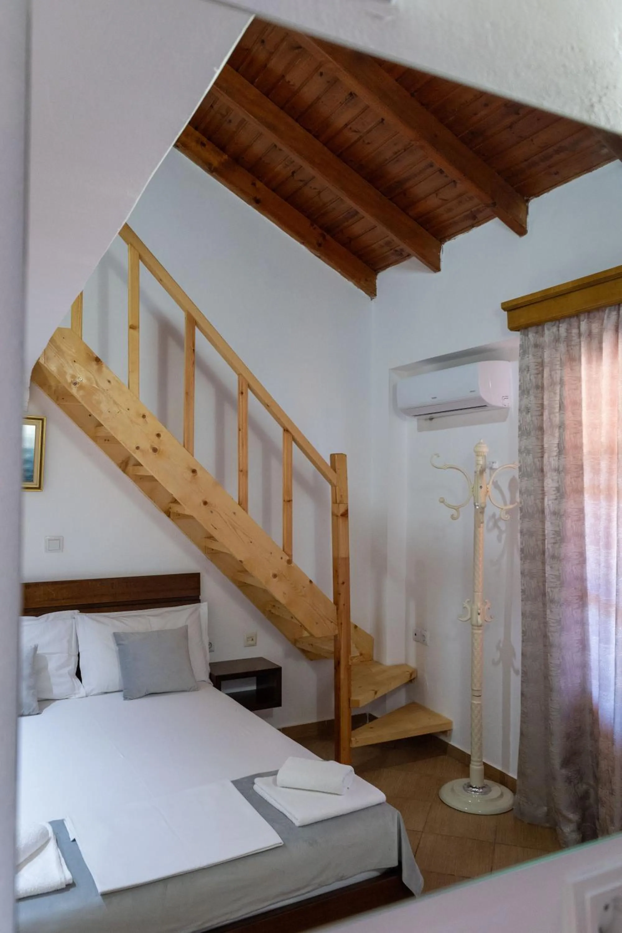 Bed in Apart Hotel Alex