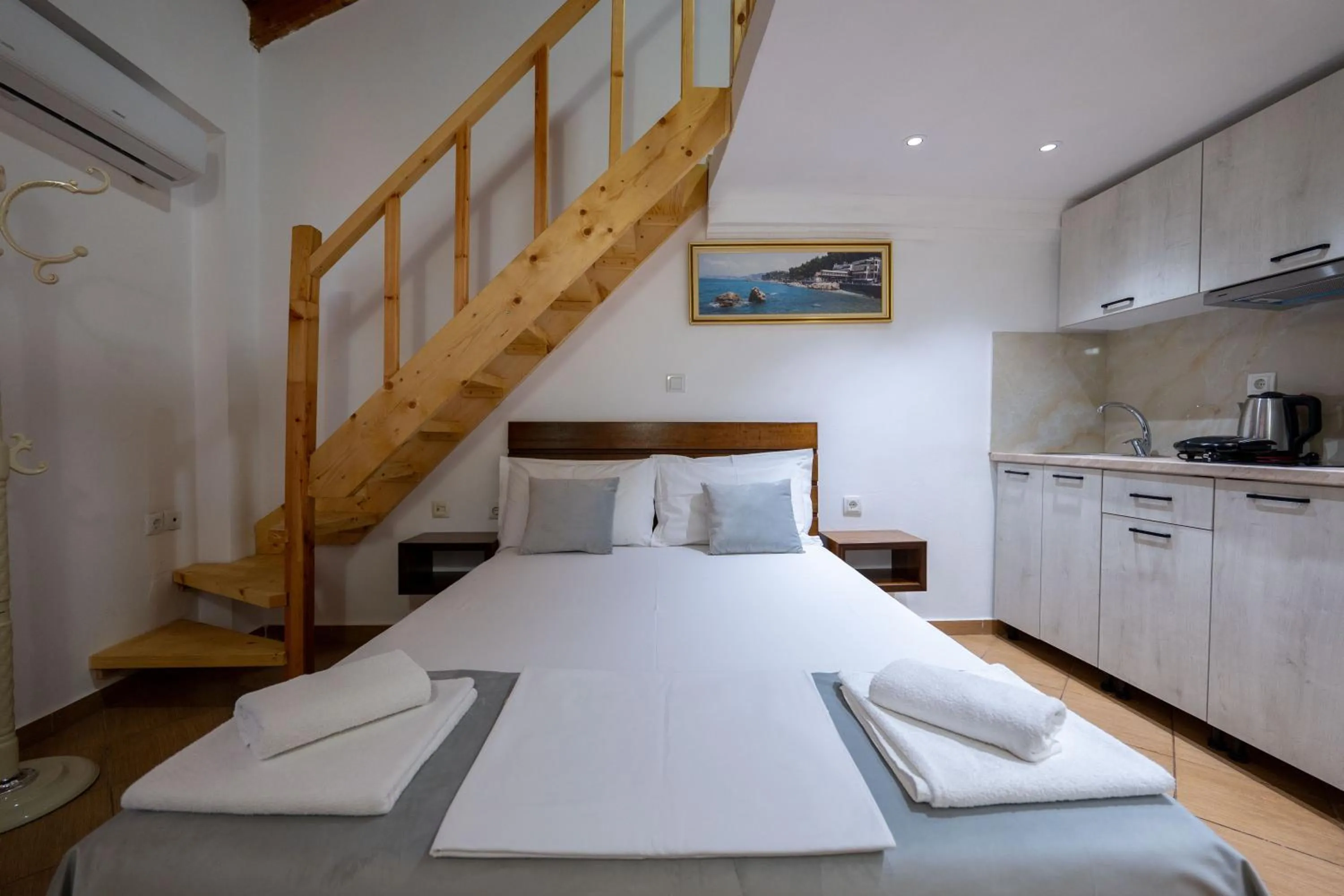 Bed in Apart Hotel Alex