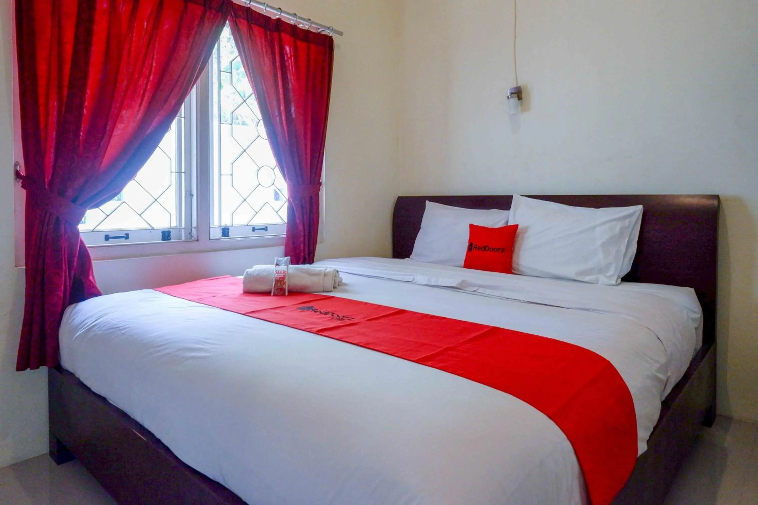 Bed in RedDoorz near Institut Pertanian Yogyakarta