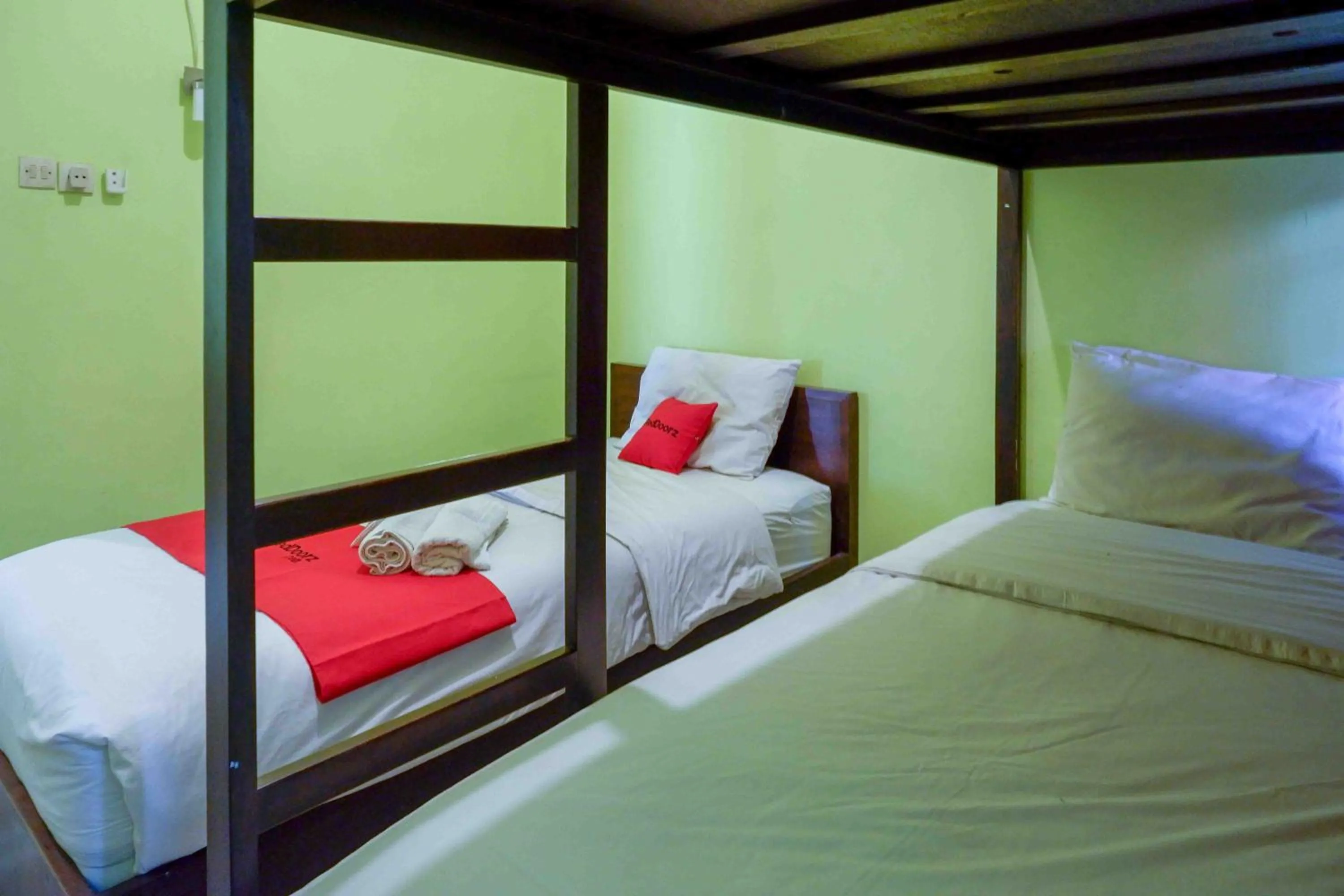 Bed in RedDoorz near Institut Pertanian Yogyakarta