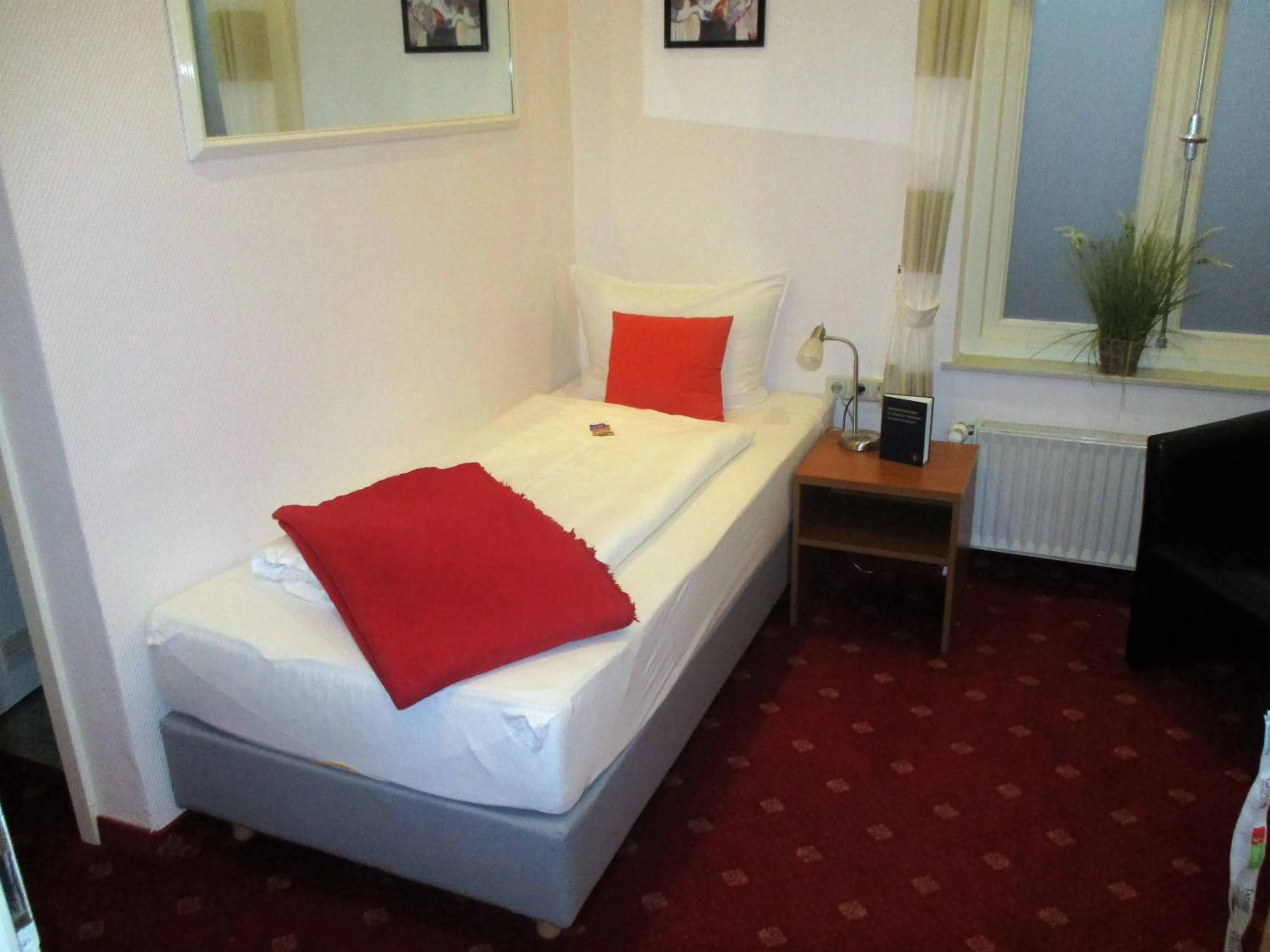 Photo of the whole room, Bed in Hotel Stadt Hamburg
