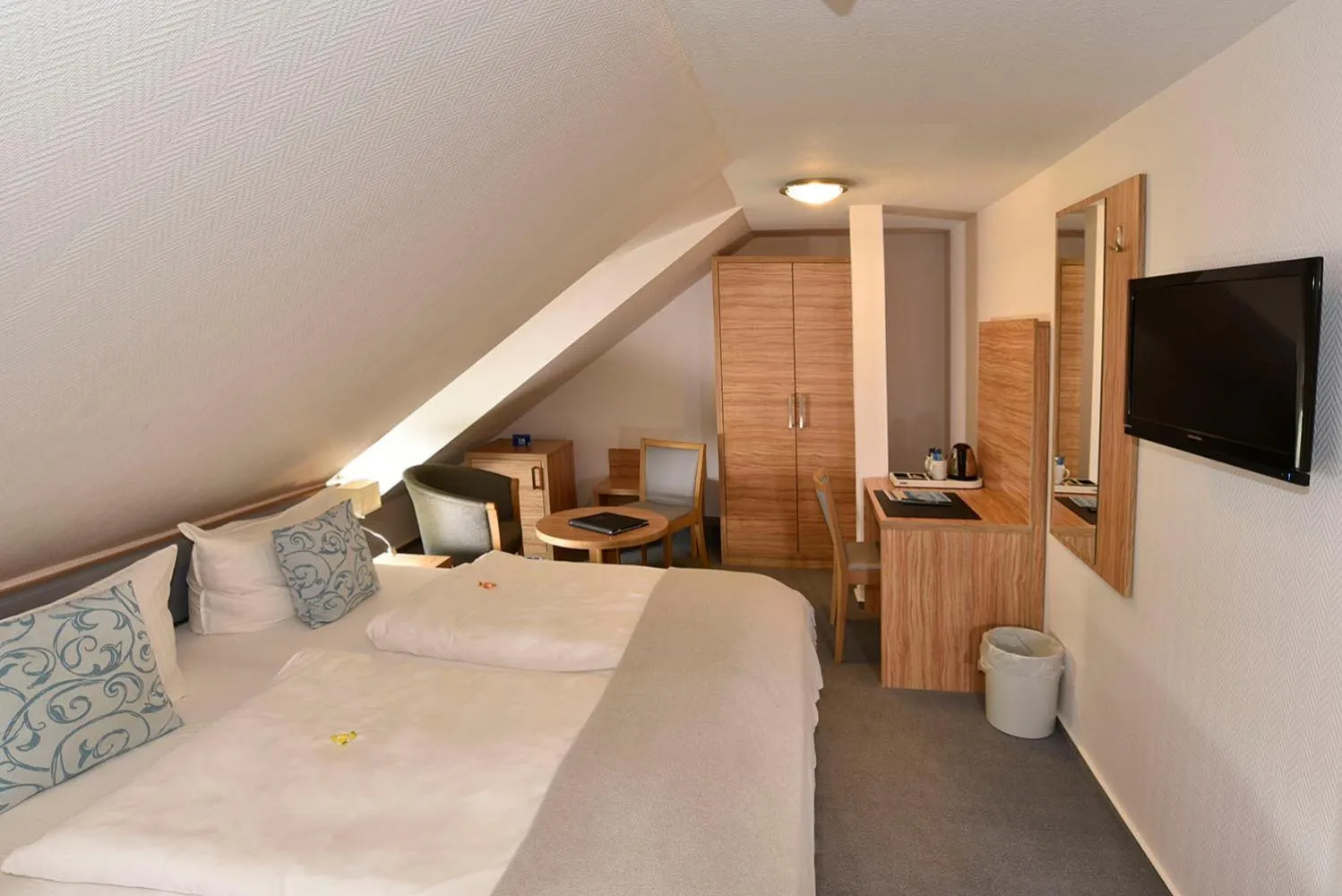 Photo of the whole room, Bed in Hotel Stadt Hamburg