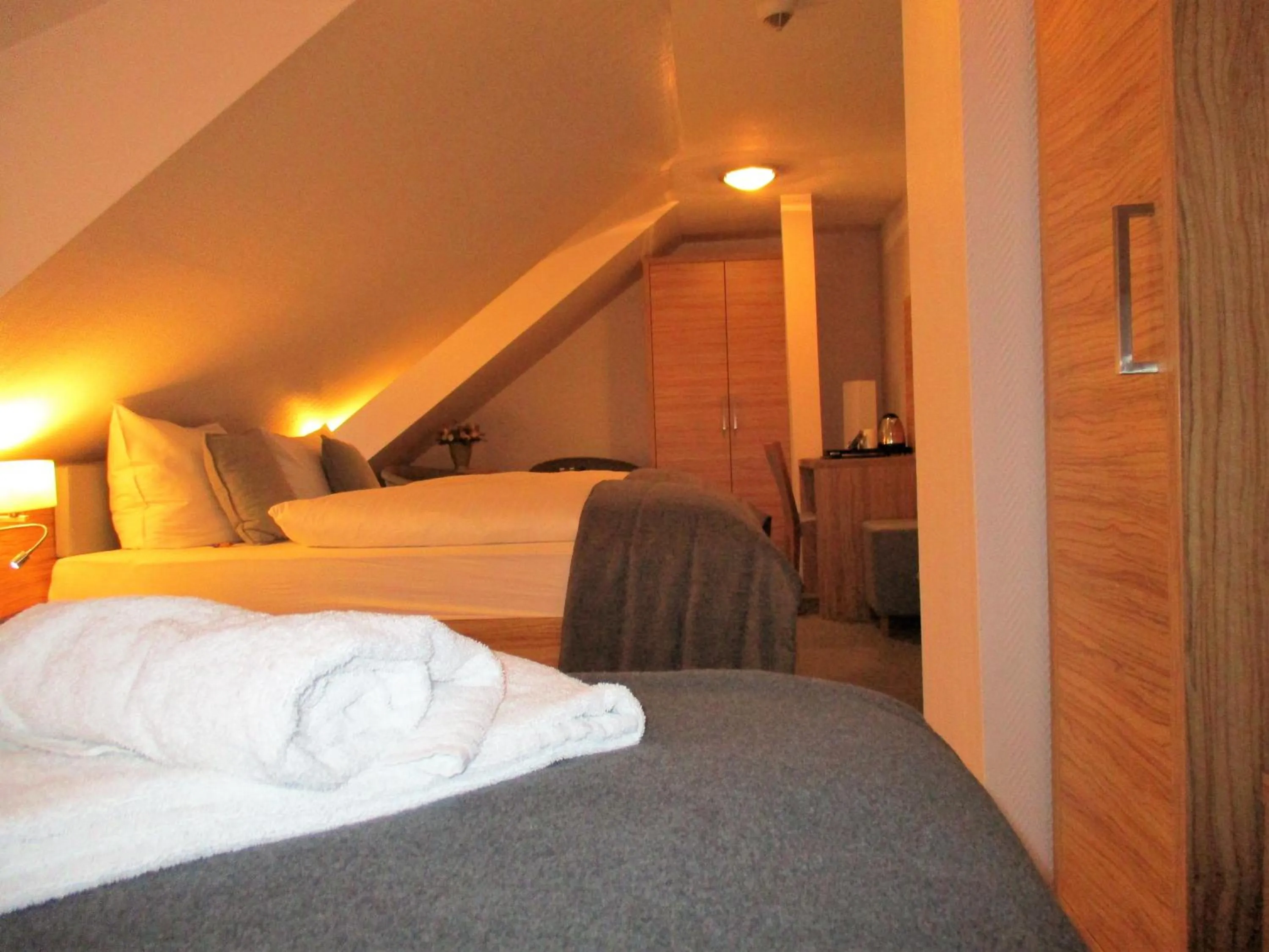 Photo of the whole room, Bed in Hotel Stadt Hamburg