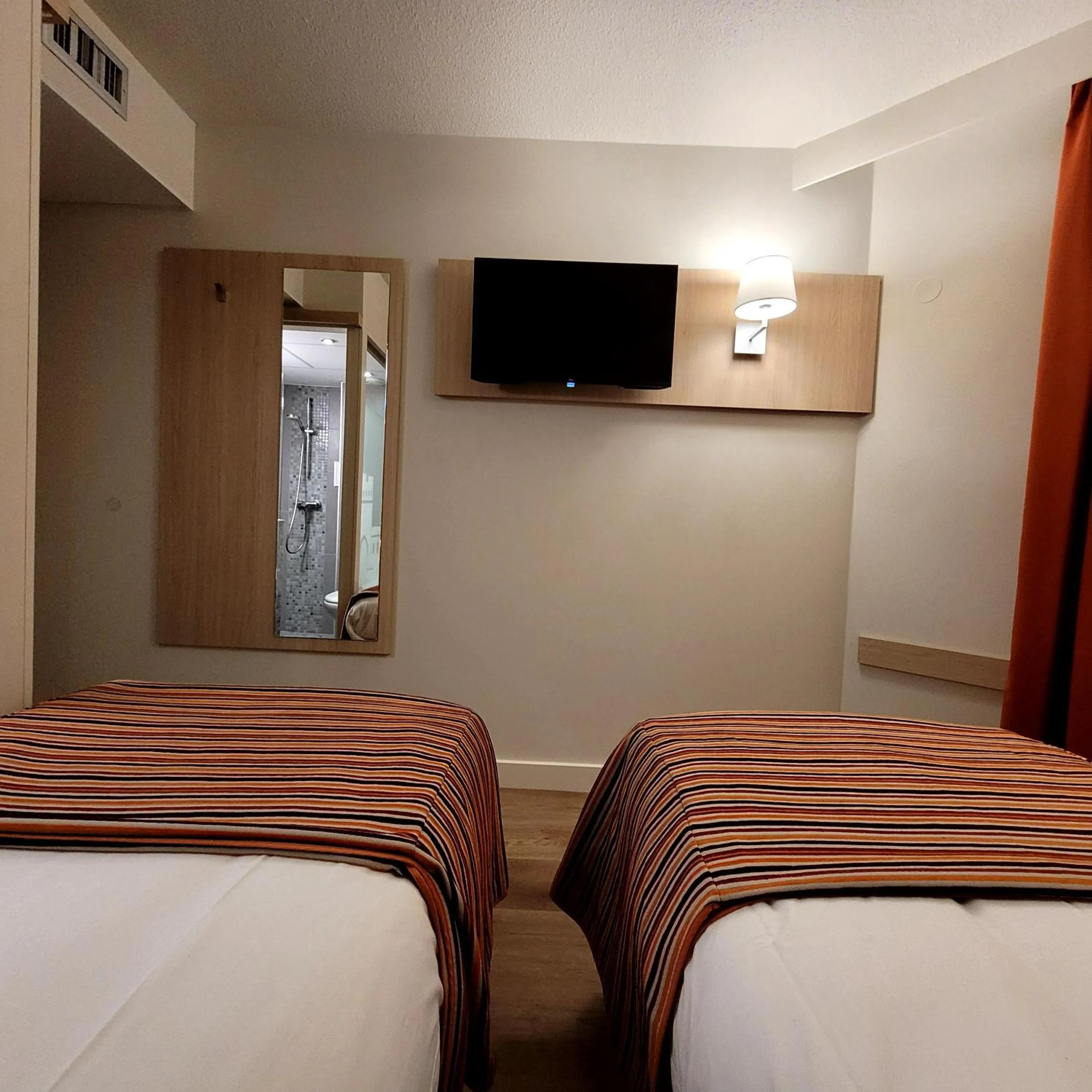 Bed in Hotel Espace Cite