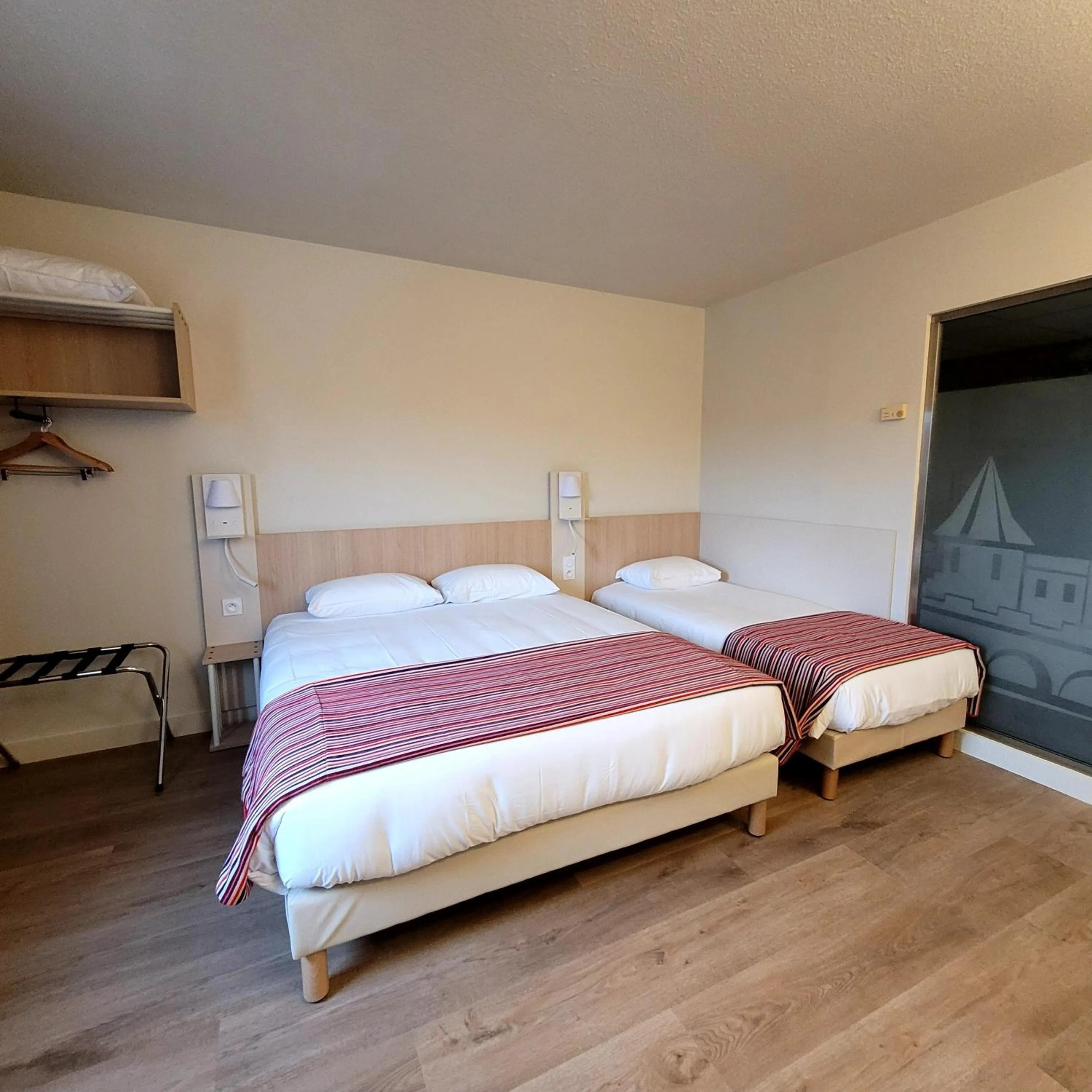 Bed in Hotel Espace Cite