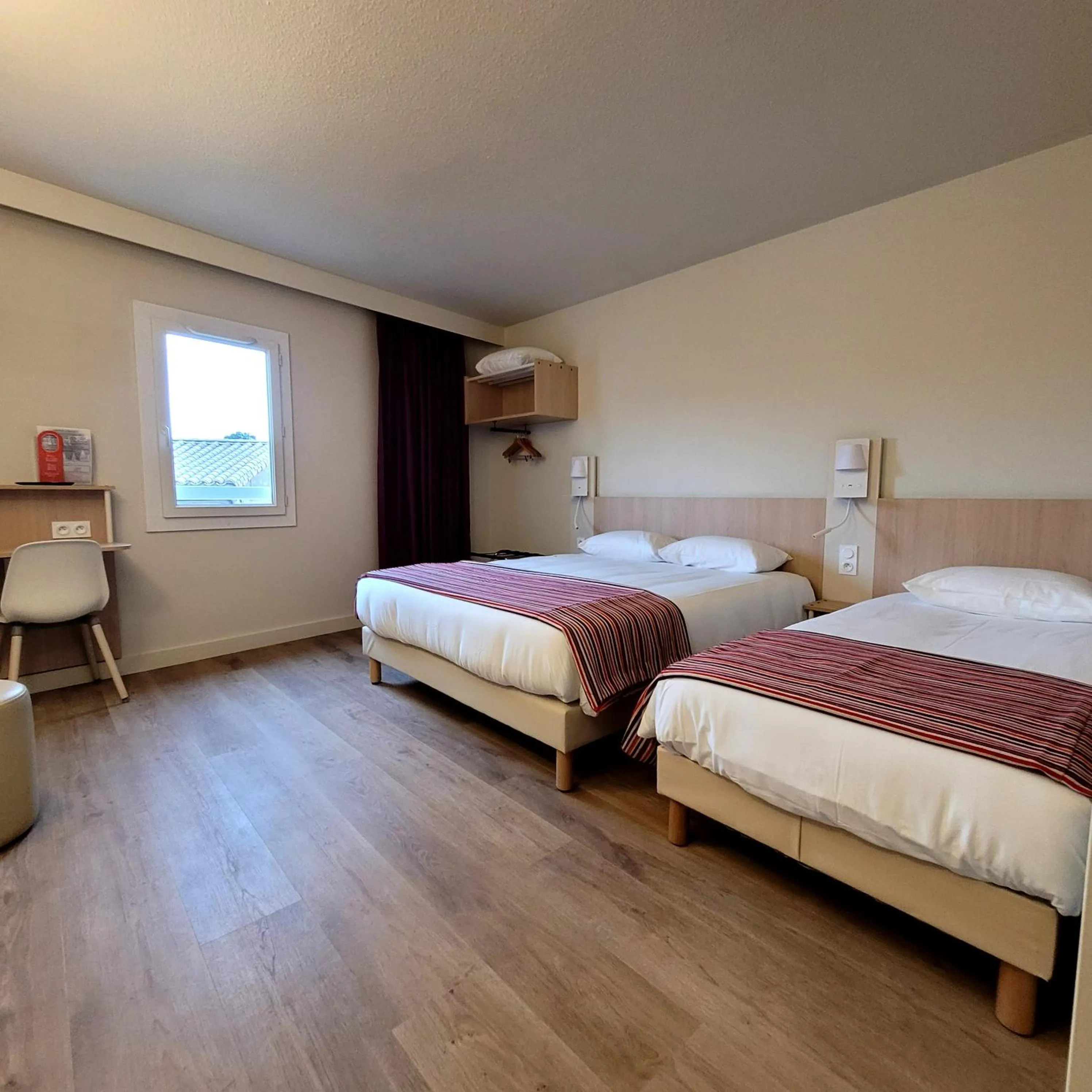 Bed in Hotel Espace Cite