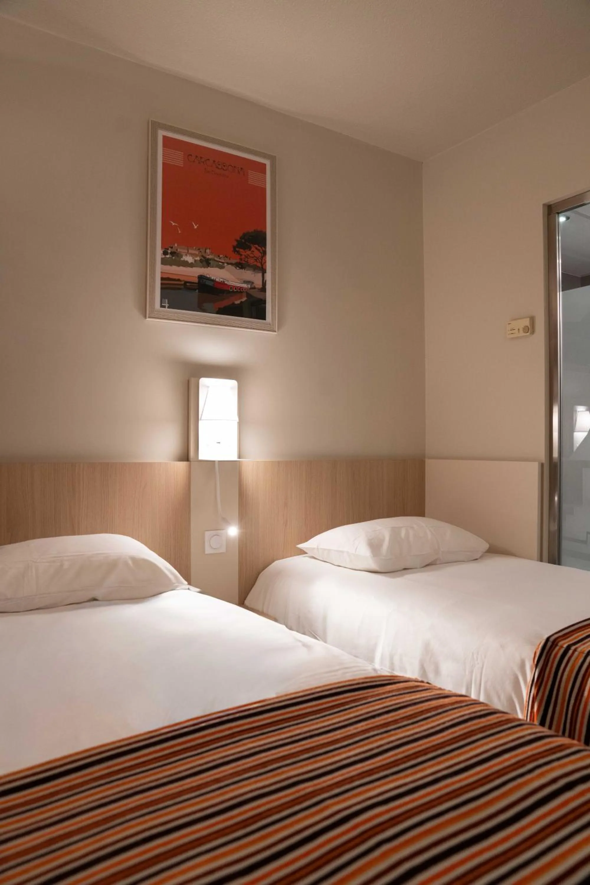 Bed in Hotel Espace Cite