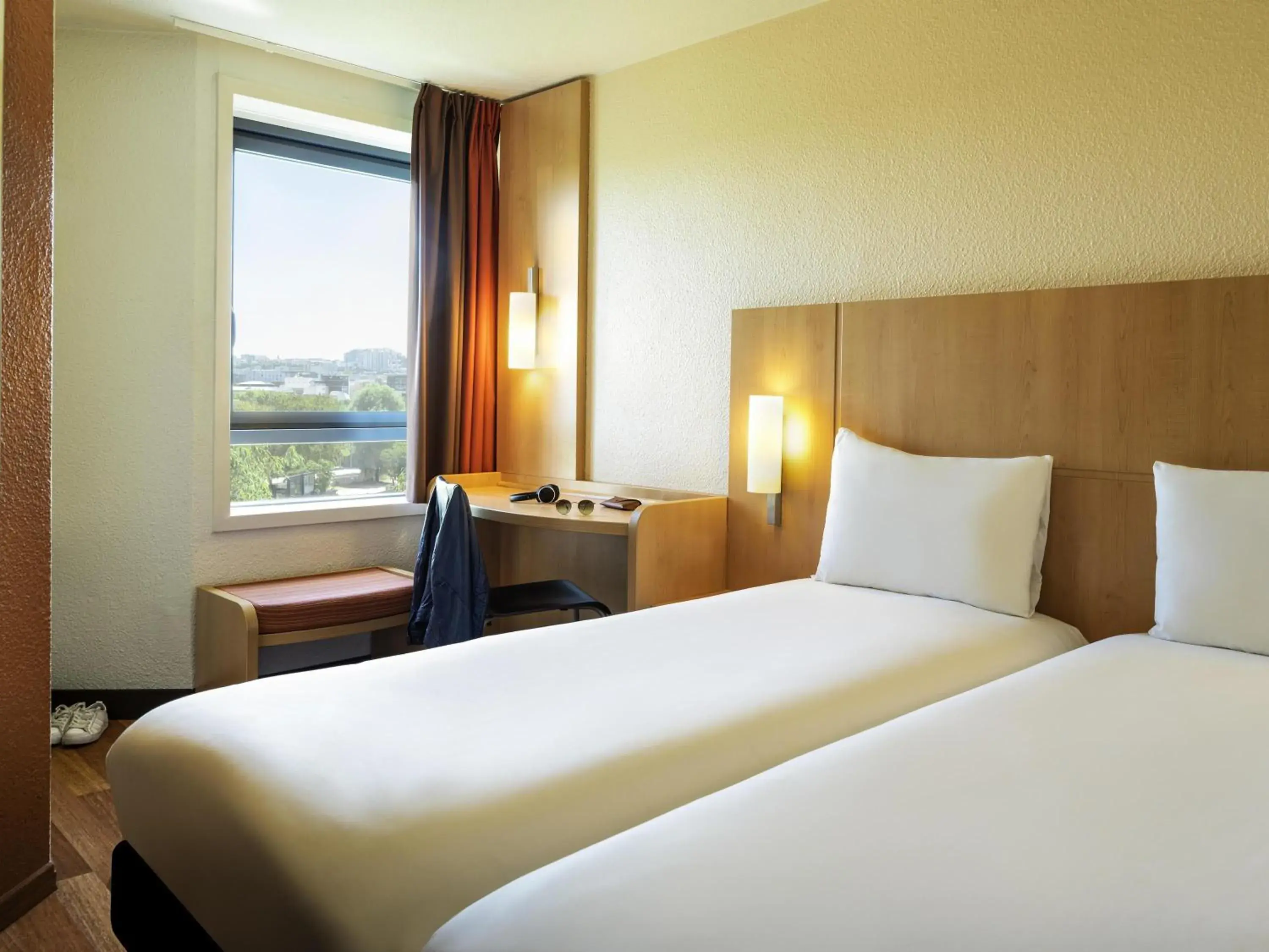 Bedroom, Bed in ibis Paris La Villette Cité des Sciences 19ème Bedroom, Bed in ibis Paris La Villette Cité des Sciences 19ème