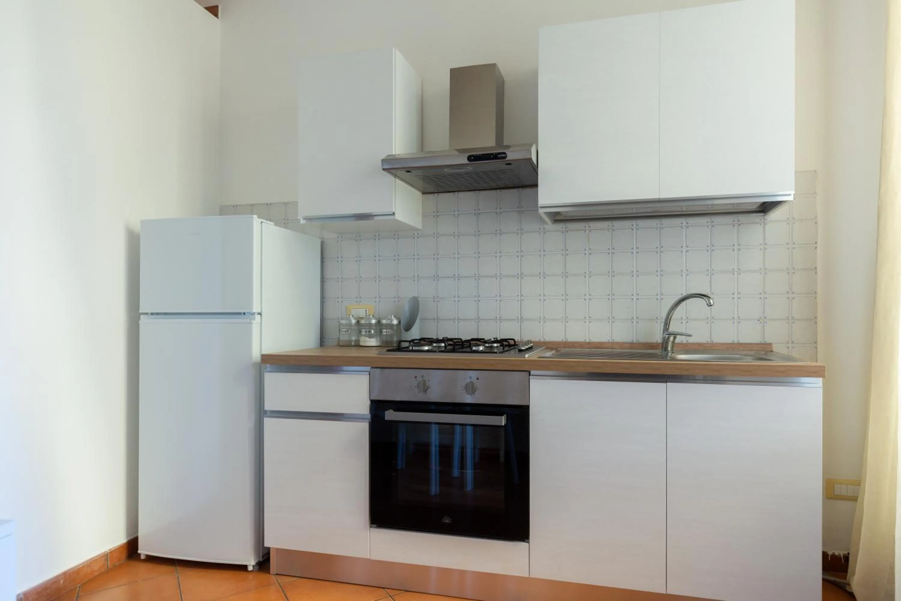 kitchen in Flowers apartments & rooms