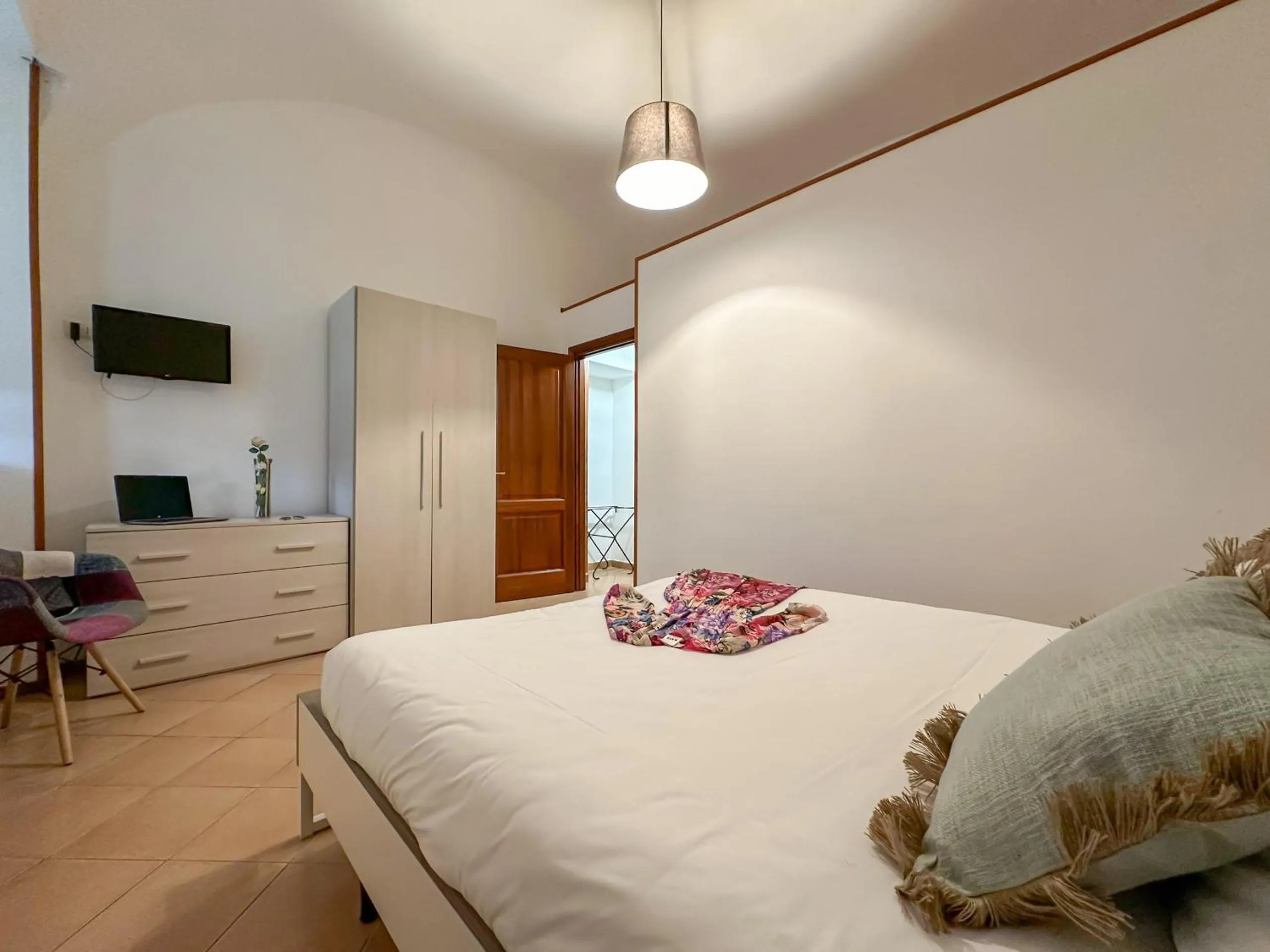 Bed in Flowers apartments & rooms