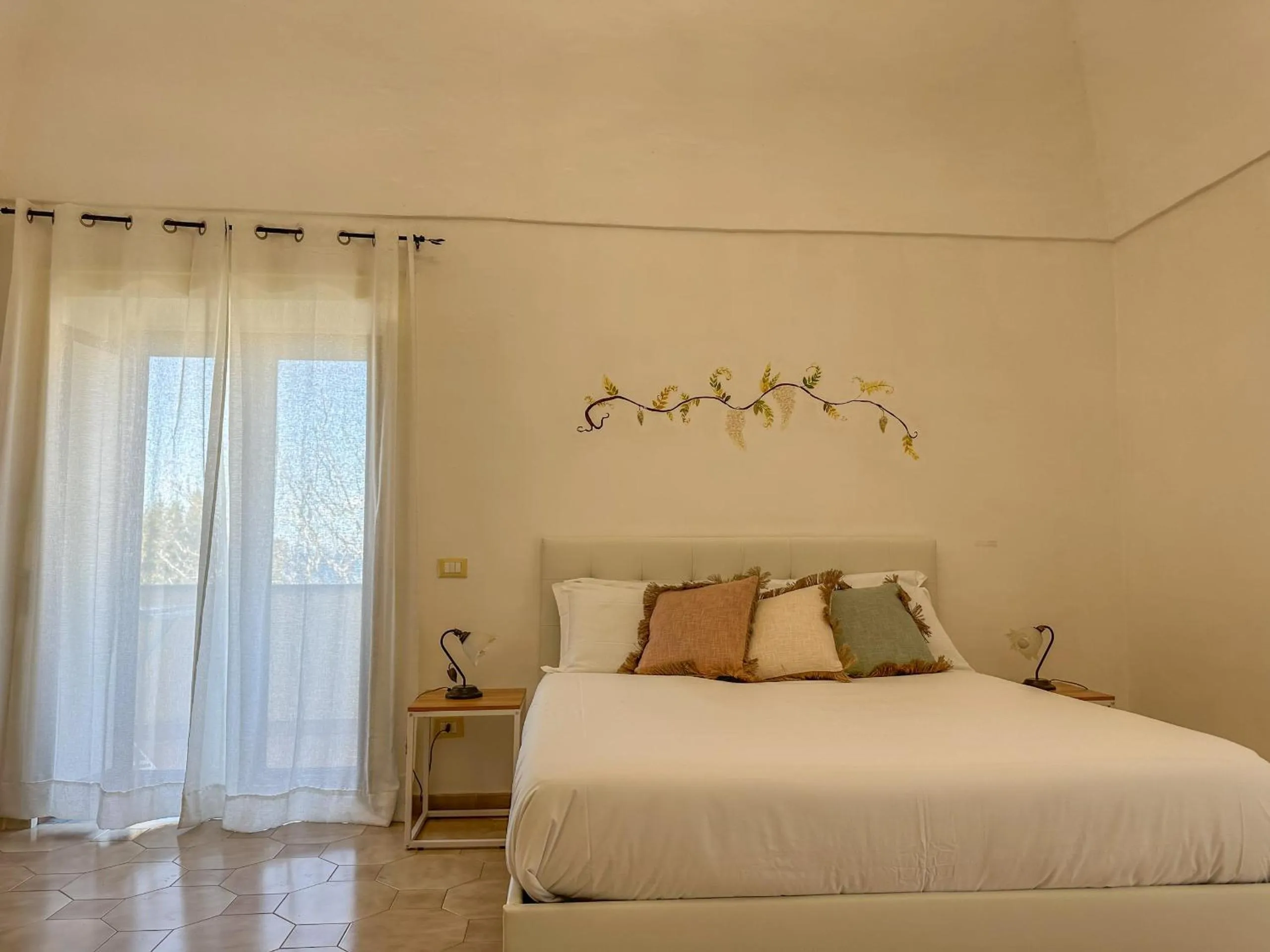 Bed in Flowers apartments & rooms