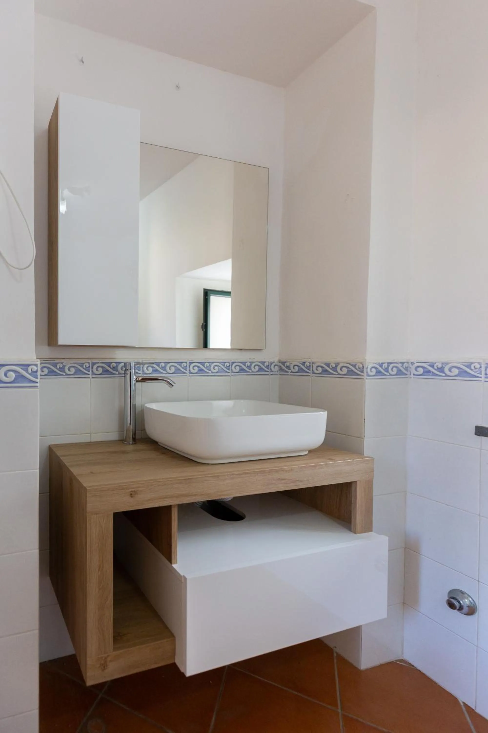 Bathroom in Flowers apartments & rooms