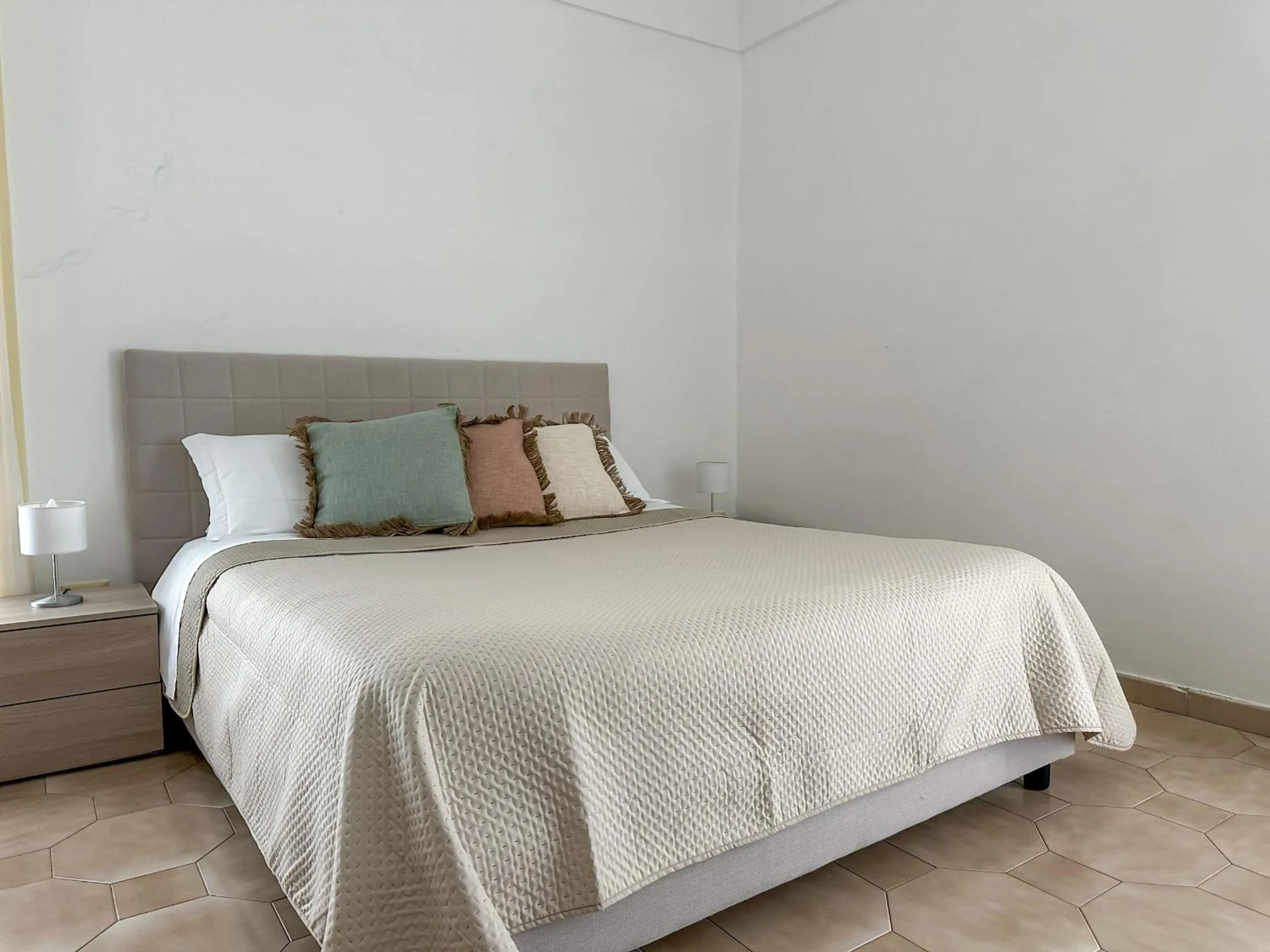 Bed in Flowers apartments & rooms