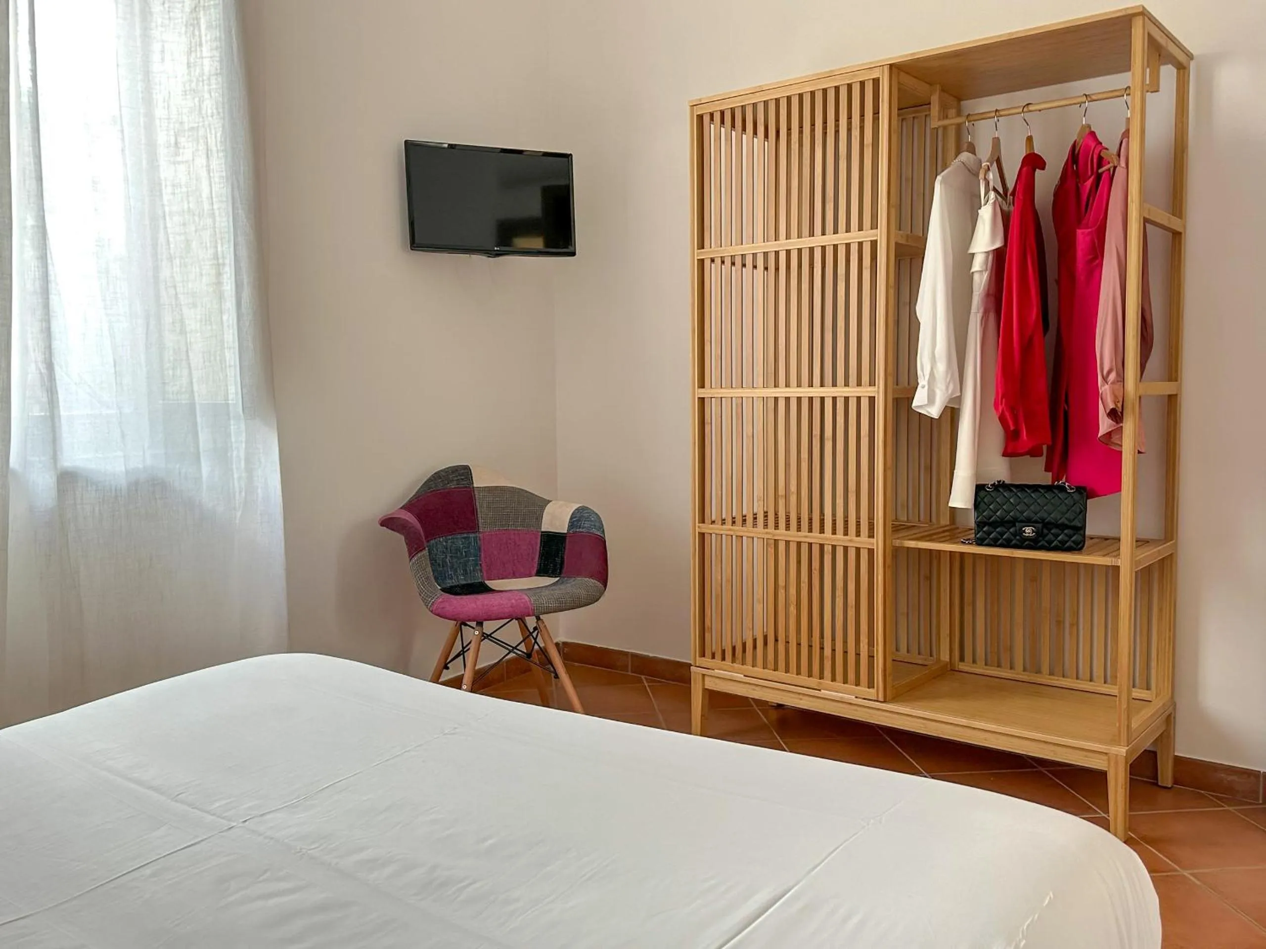 Bed in Flowers apartments & rooms