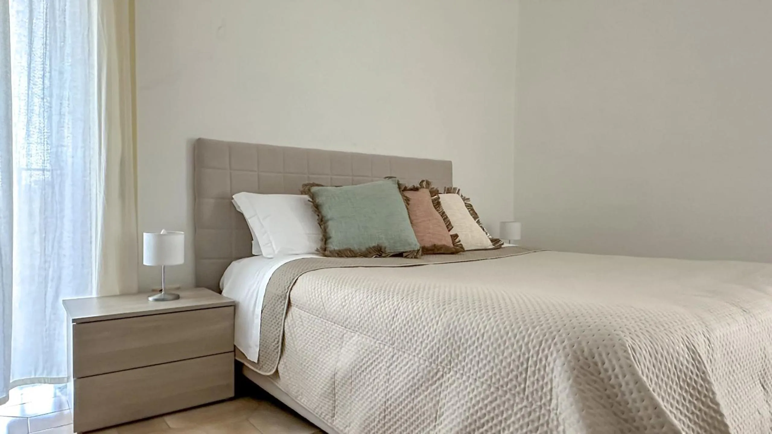 Bed in Flowers apartments & rooms