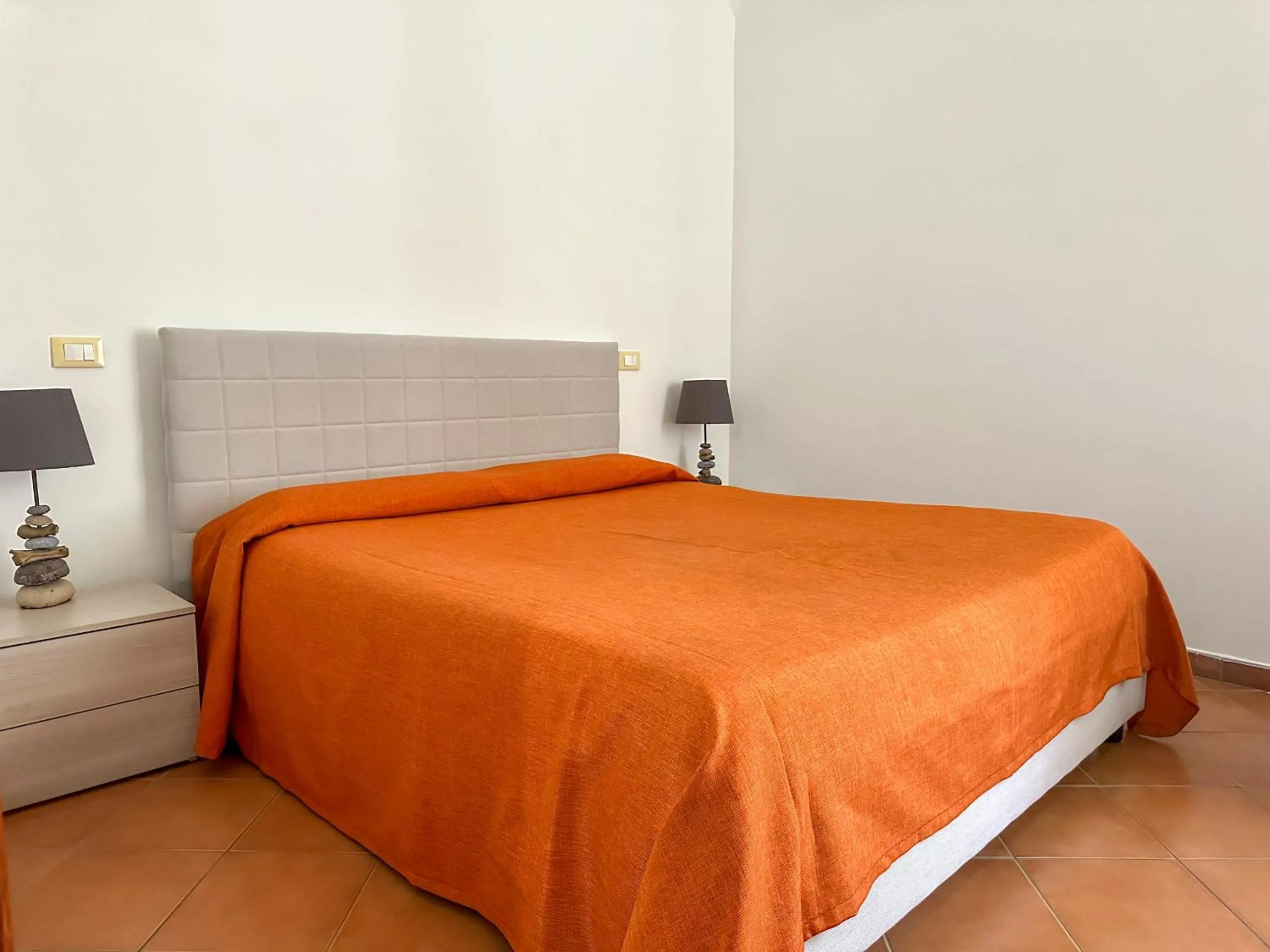 Bed in Flowers apartments & rooms