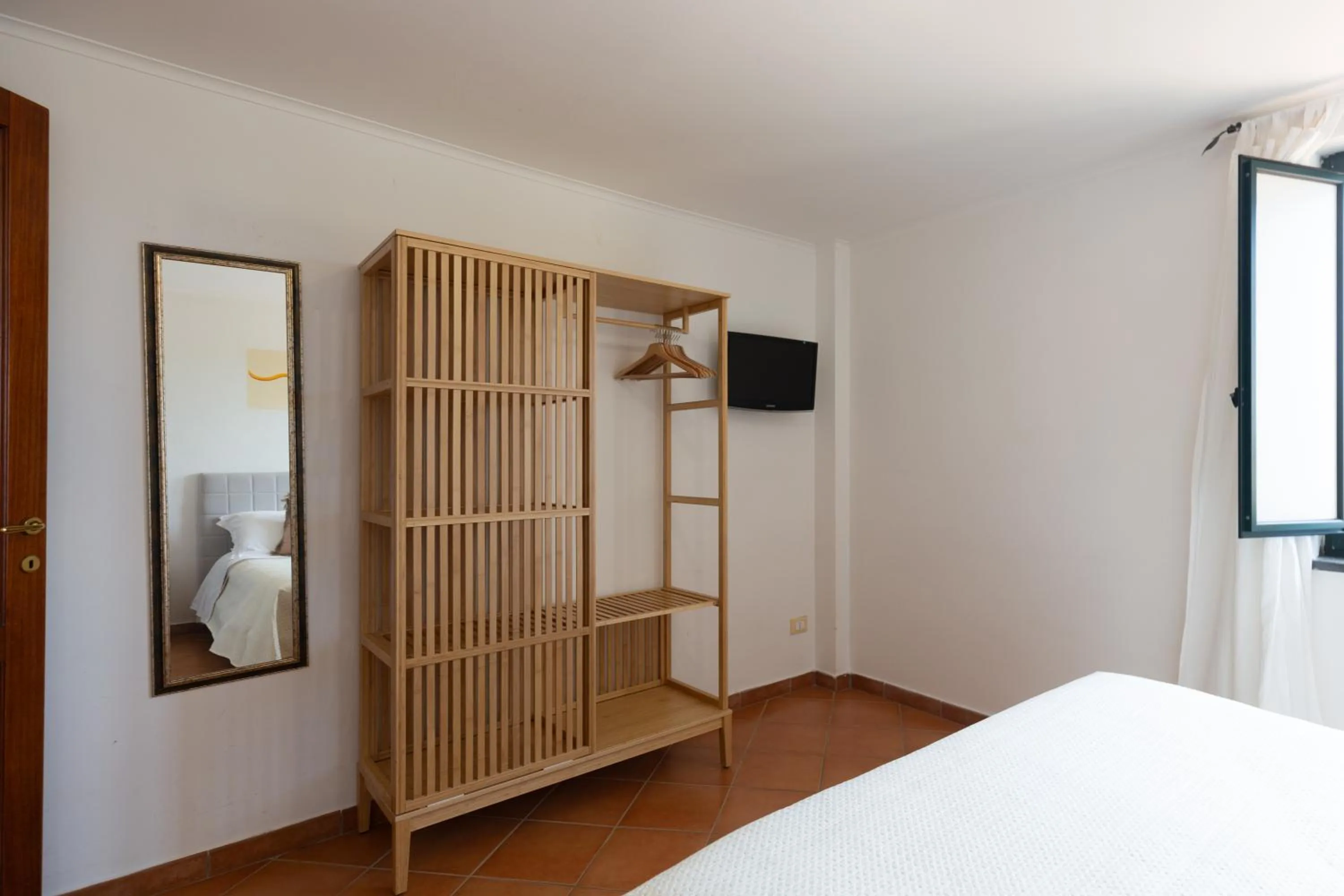 Bed in Flowers apartments & rooms