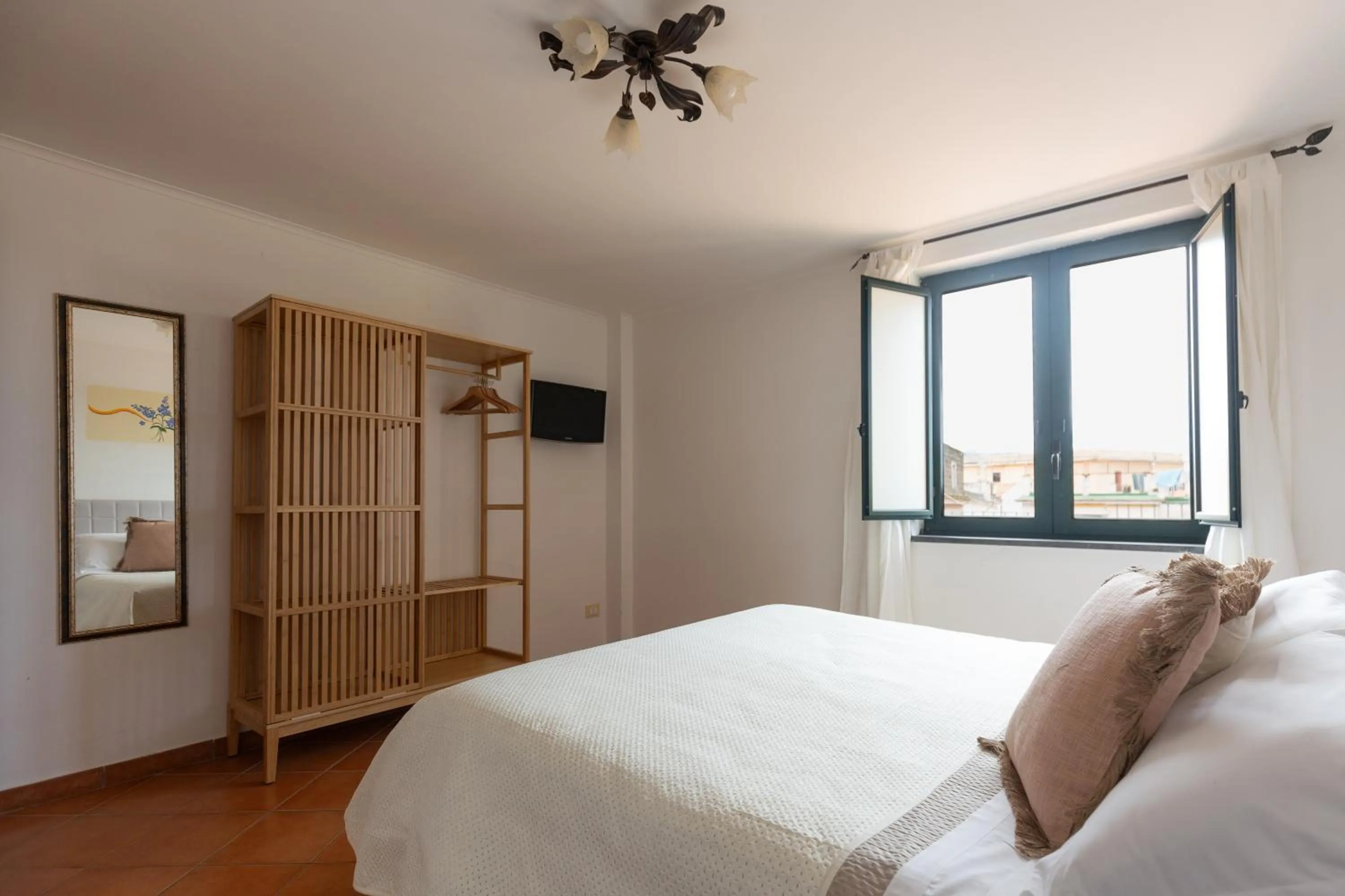 Bedroom, Bed in Flowers apartments & rooms