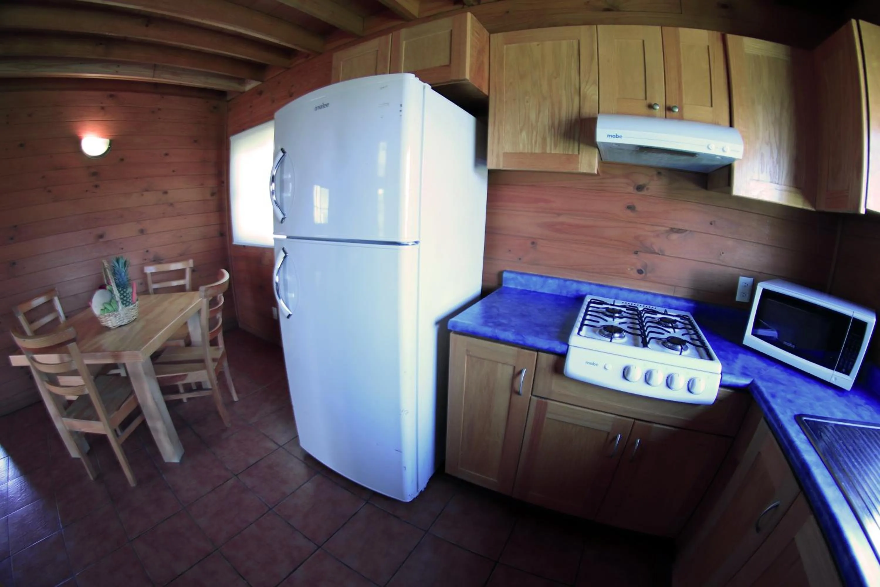 Kitchen or kitchenette in Cabañas Molino del Rey